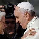 FILE - In this Sunday, Sept. 28, 2014 file photo, Pope Francis, right, hugs Emeritus Pope Benedict XVI prior to the start of a meeting with elderly faithful in St. Peter's Square at the Vatican. Emeritus Pope Benedict XVI has marked the eighth anniversary of his historic resignation by insisting in an interview published in Corriere della Sera Monday, March 1, 2021, that he stepped down knowingly and that “there is only one pope” _ Francis. (AP Photo/Gregorio Borgia, File)