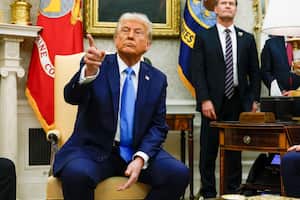 WASHINGTON, DC - FEBRUARY 04: U.S. President Donald Trump, accompanied by U.S. National Security Adviser Michael Waltz (R) takes a question from a reporter during a meeting with Israeli Prime Minister Benjamin Netanyahu in the Oval Office of the White House on February 04, 2025 in Washington, DC. Netanyahu is the first foreign leader to visit Trump since he returned to the White House last month.   Anna Moneymaker/Getty Images/AFP (Photo by Anna Moneymaker / GETTY IMAGES NORTH AMERICA / Getty Images via AFP)