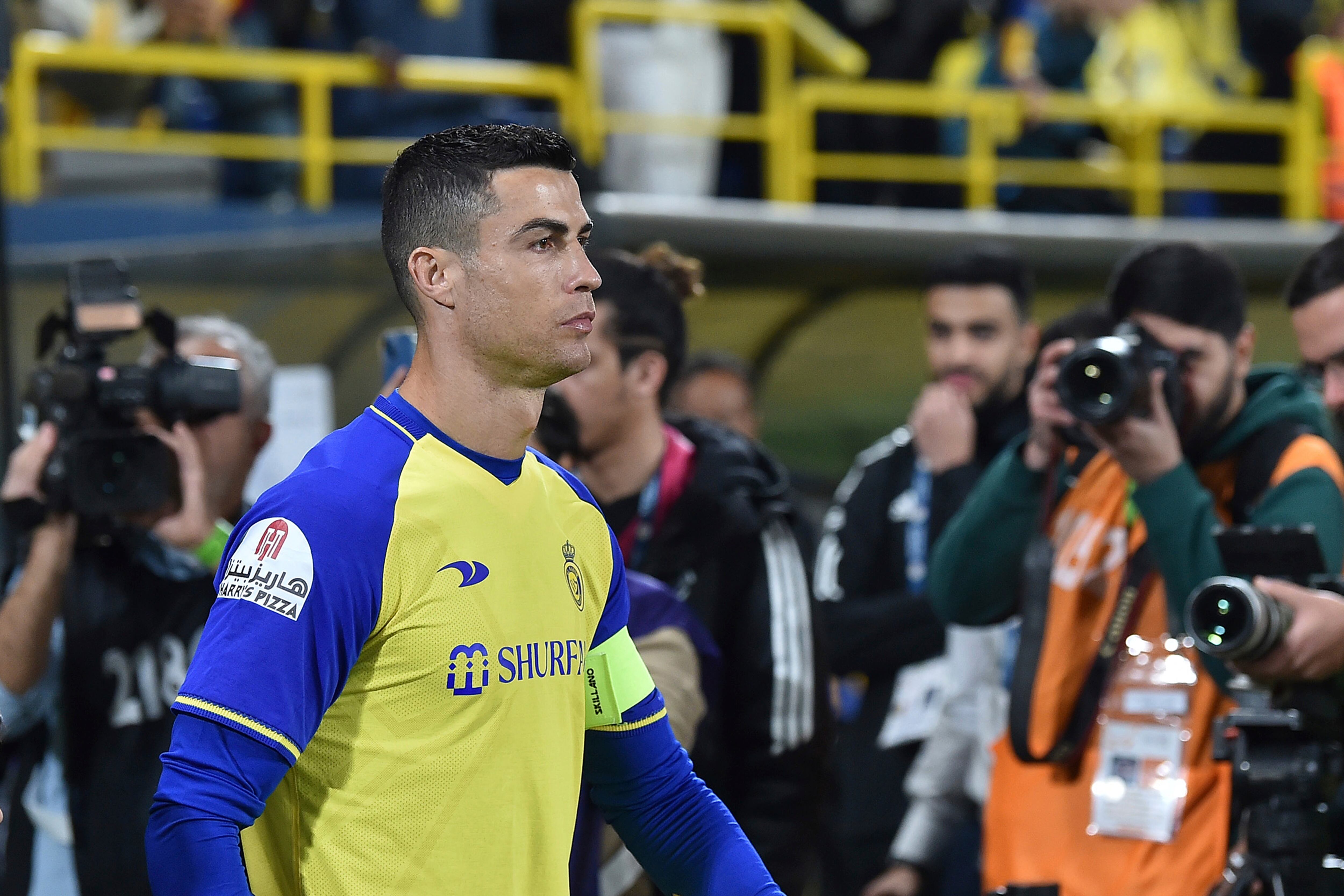 Al Nassr's Cristiano Ronaldo enters the pitch to play the Saudi Pro League match between Al Ettifaq FC and Al Nassr FC at Mrsool Park Stadium, in Riyadh, Saudi Arabia, Sunday, Jan. 22, 2023. (AP Photo)