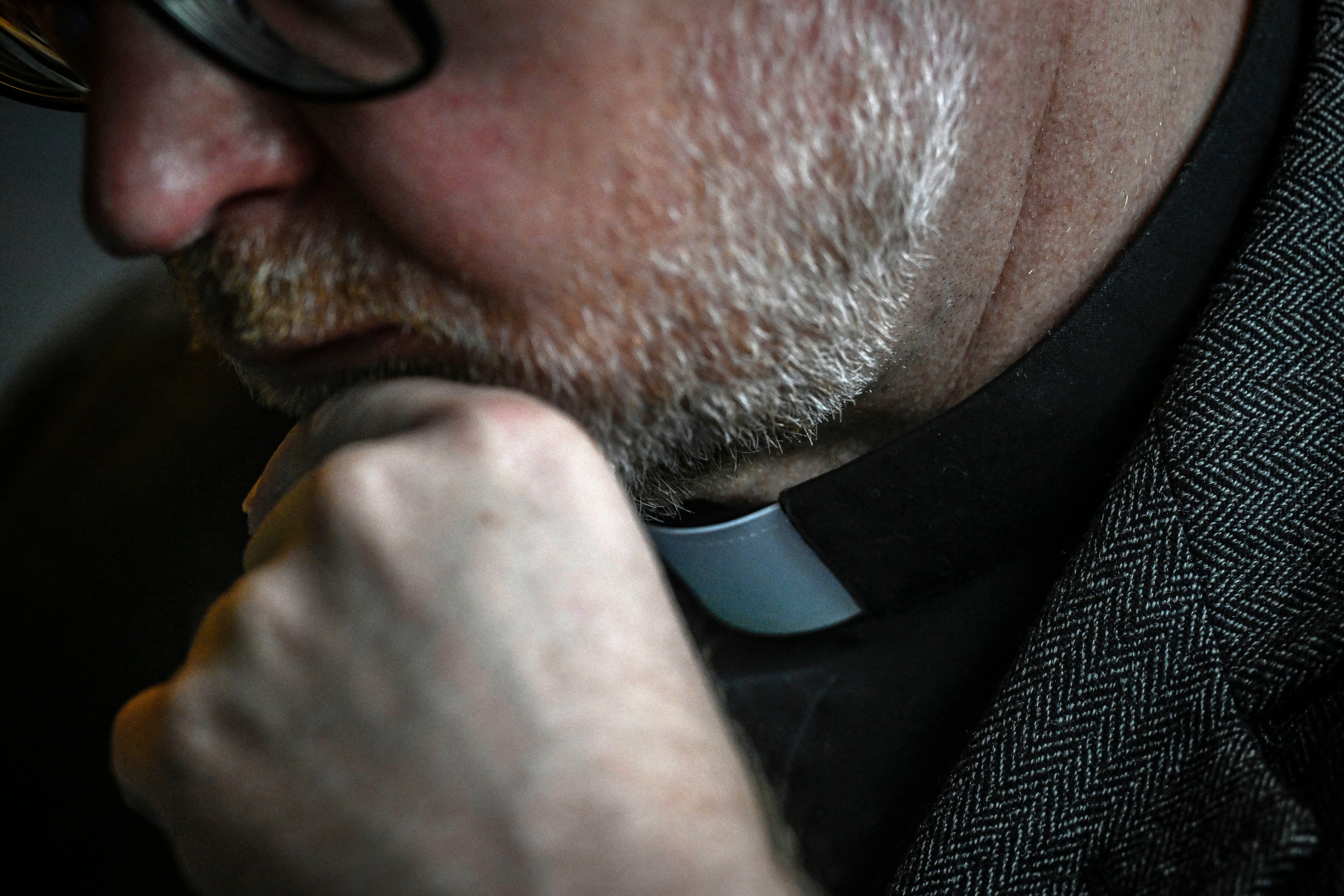 A priest attends a press conference held by an independent commission for the study of sexual abuse of children in the Portuguese Catholic Church at Gulbenkian Foundation in Lisbon, on February 13, 2023. - Catholic clergy in Portugal have abused nearly 5,000 children since 1950, an independent commission said today. The Portuguese inquiry, commissioned by the Church in the staunchly Catholic country, published its findings after hearing from more than 500 victims last year. (Photo by PATRICIA DE MELO MOREIRA / AFP)