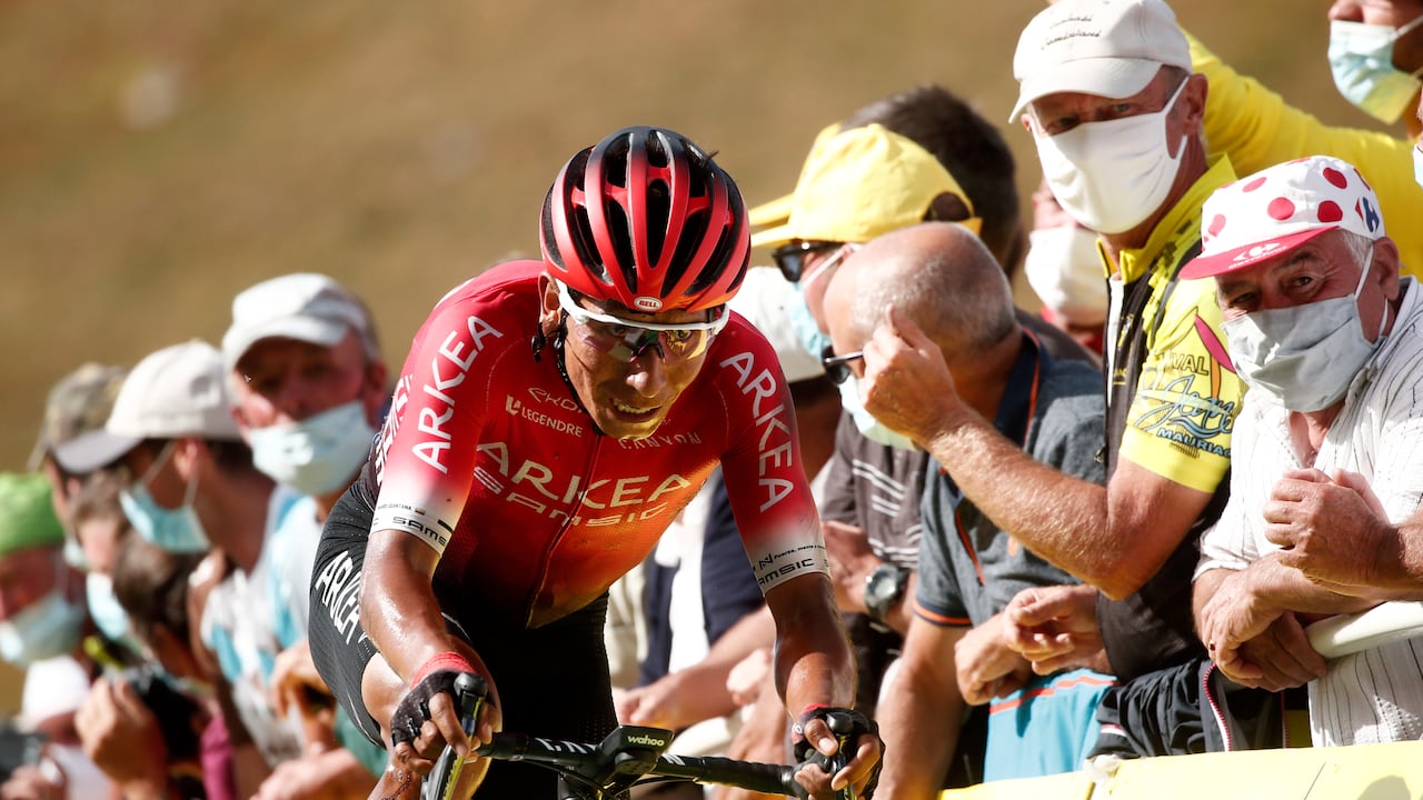 Colombia's Nairo Quintana crosses the finish line of the stage 13 of the Tour de France cycling race over 191 kilometers from Chatel-Guyon to Puy Mary, Friday, Sept. 11, 2020. (Benoit Tessier, Pool via AP)