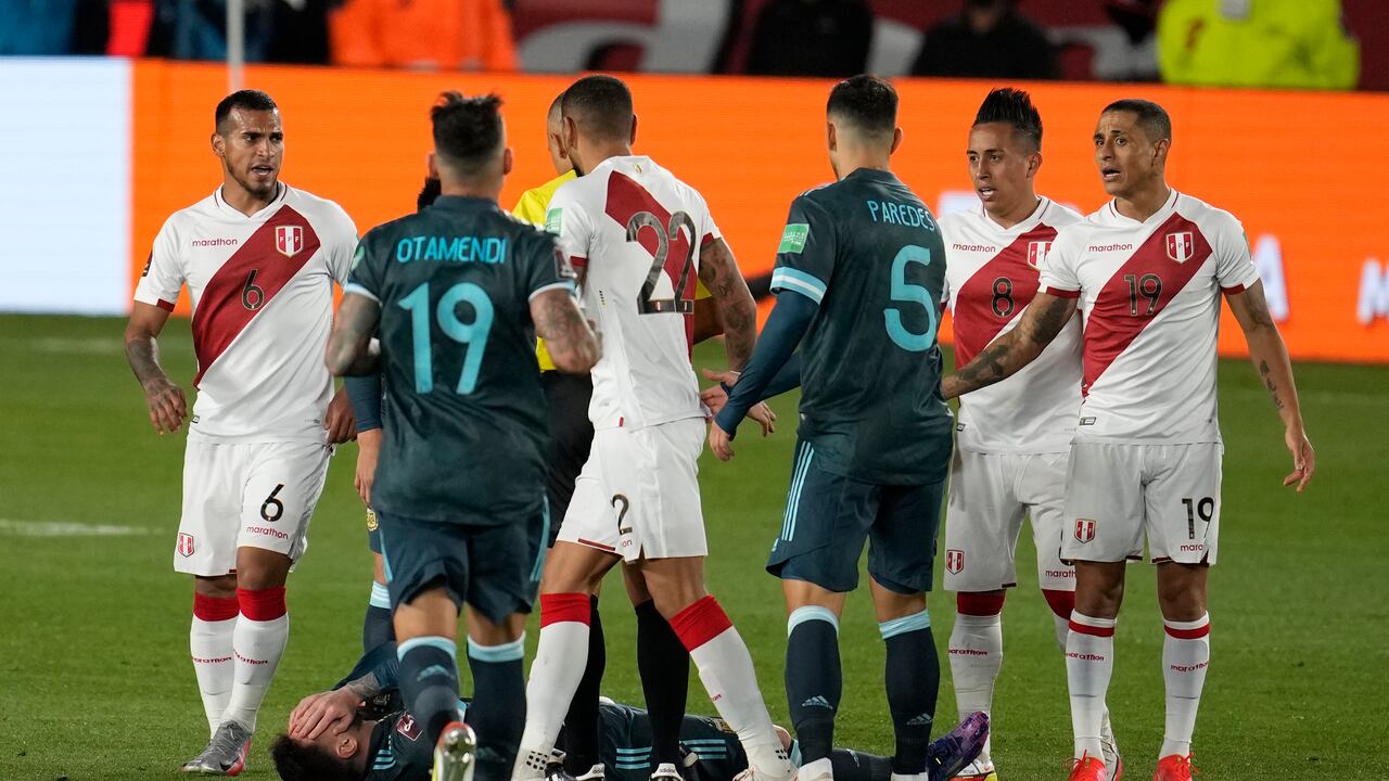 Argentina's Lionel Messi grimaces in pain during a qualifying soccer match for the FIFA World Cup Qatar 2022 against Peru at Monumental Antonio Vespucio Liberti stadium in Buenos Aires, Argentina, Thursday, Oct.14, 2021. (AP Photo/Natacha Pisarenko)