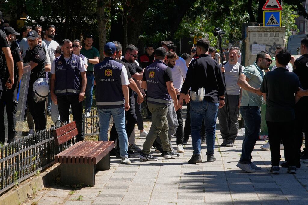 Police block and detain some protesters as they try to march in support of transgender people and their rights during the LGBTQ Pride week, in Istanbul, Turkey, Sunday, June 21, 2026. (AP Photo/Dilara Acikgoz)
