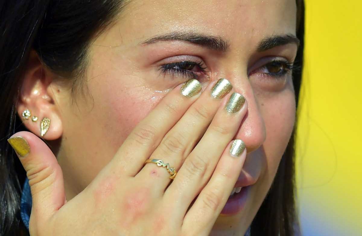 La emoción fue inevitable al estar en el podio. AP/Patrick Semansky