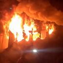 In this image taken from video by Taiwan's EBC, fire and smoke pour out from a building in Kaohsiung, in southern Taiwan on Thursday, Oct. 14, 2021. The fire engulfed a 13-story building overnight in southern Taiwan, the island's semi-official Central News Agency reported Thursday. (EBC via AP )