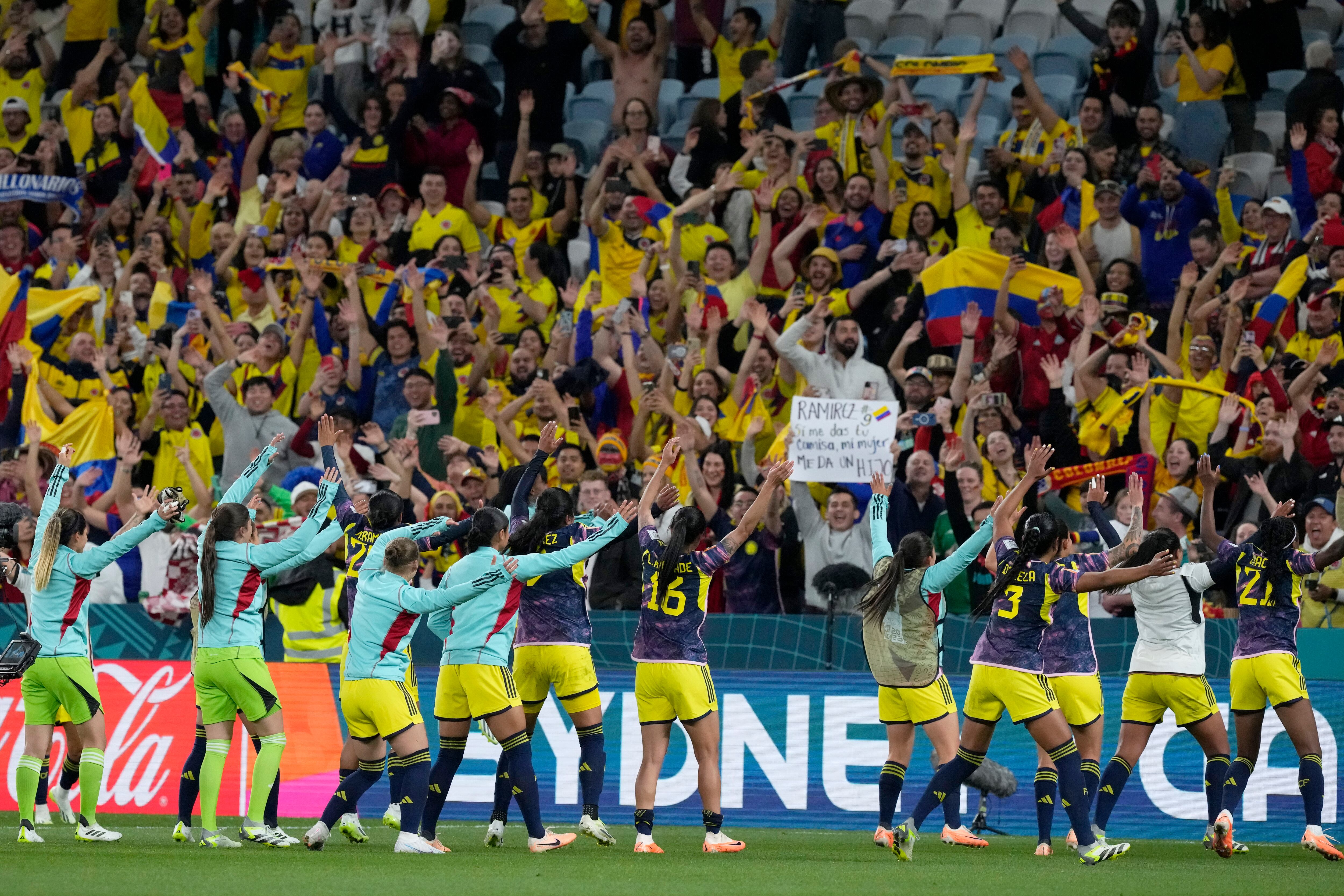Colombia players celebrate with the fans at the end of the Women's World Cup Group H soccer match between Germany and Colombia at the Sydney Football Stadium in Sydney, Australia, Sunday, July 30, 2023. Colombia won 2-1. (AP Photo/Mark Baker)