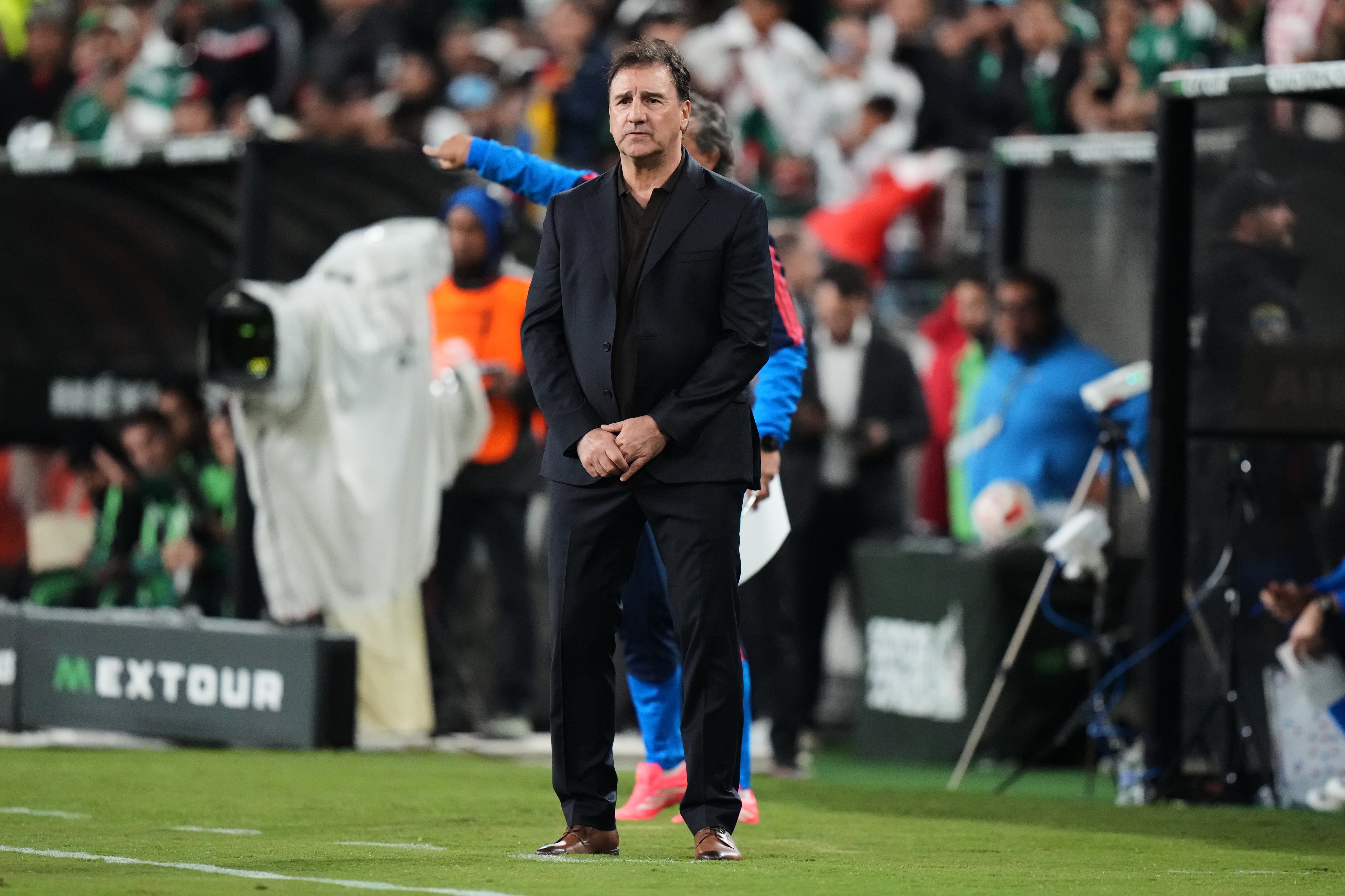 Colombia head coach Nestor Lorenzo watches from the sidelines during the first half of an international friendly soccer match against Mexico, Saturday, Sept. 26, 2026, in Baltimore. (AP Photo/Stephanie Scarbrough)