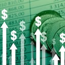 Dollar currency growth concept with upward arrows on charts and coins background.