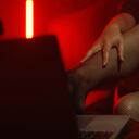 Webcam model working. Foot fetish concept.