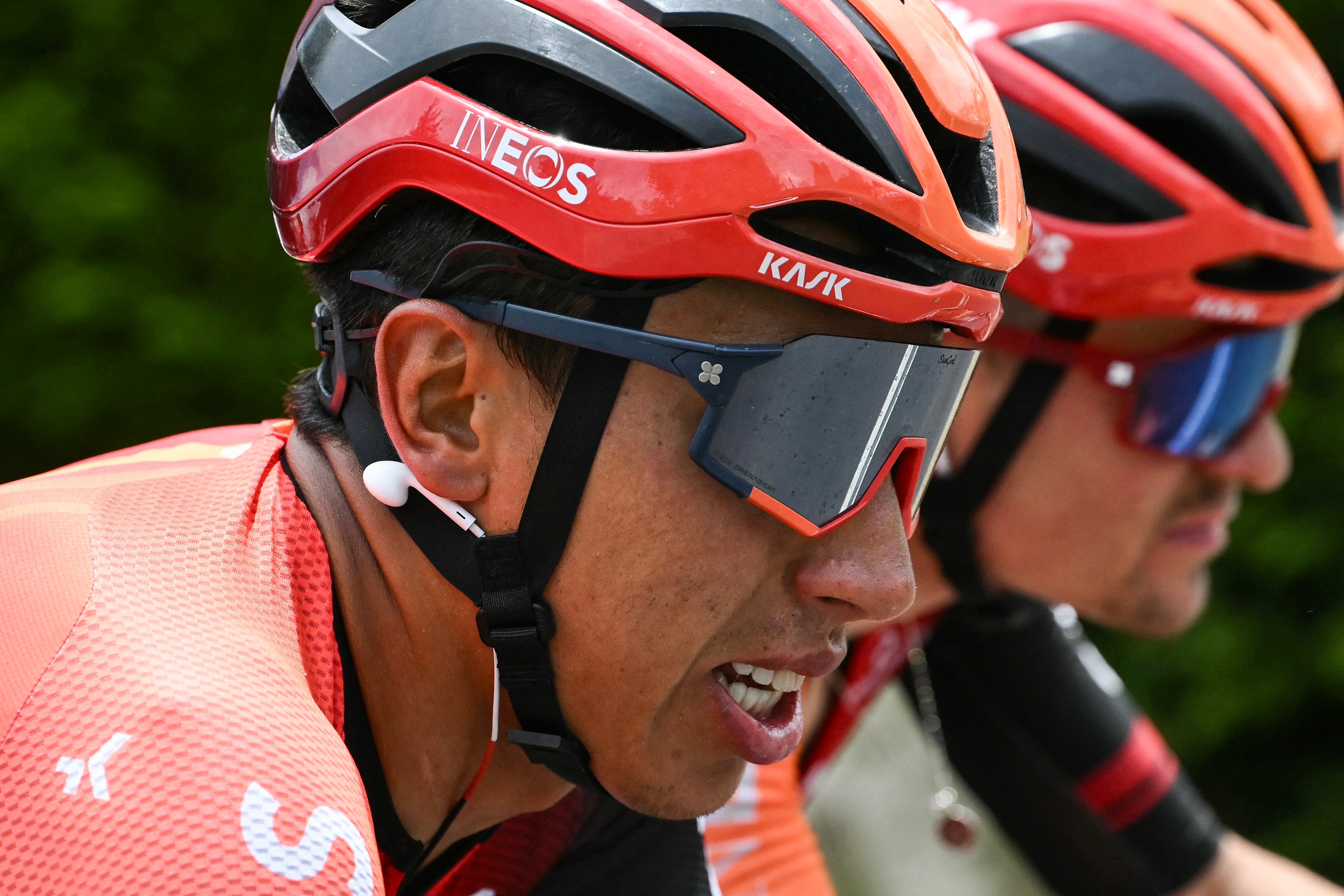 INEOS Grenadiers team's Colombian rider Egan Bernal (L) and INEOS Grenadiers team's British rider Tom Pidcock (R) cycle during the 11th stage of the 111th edition of the Tour de France cycling race, 211 km between �vaux-les-Bains and Le Lioran, on July 10, 2024. (Photo by Marco BERTORELLO / AFP)