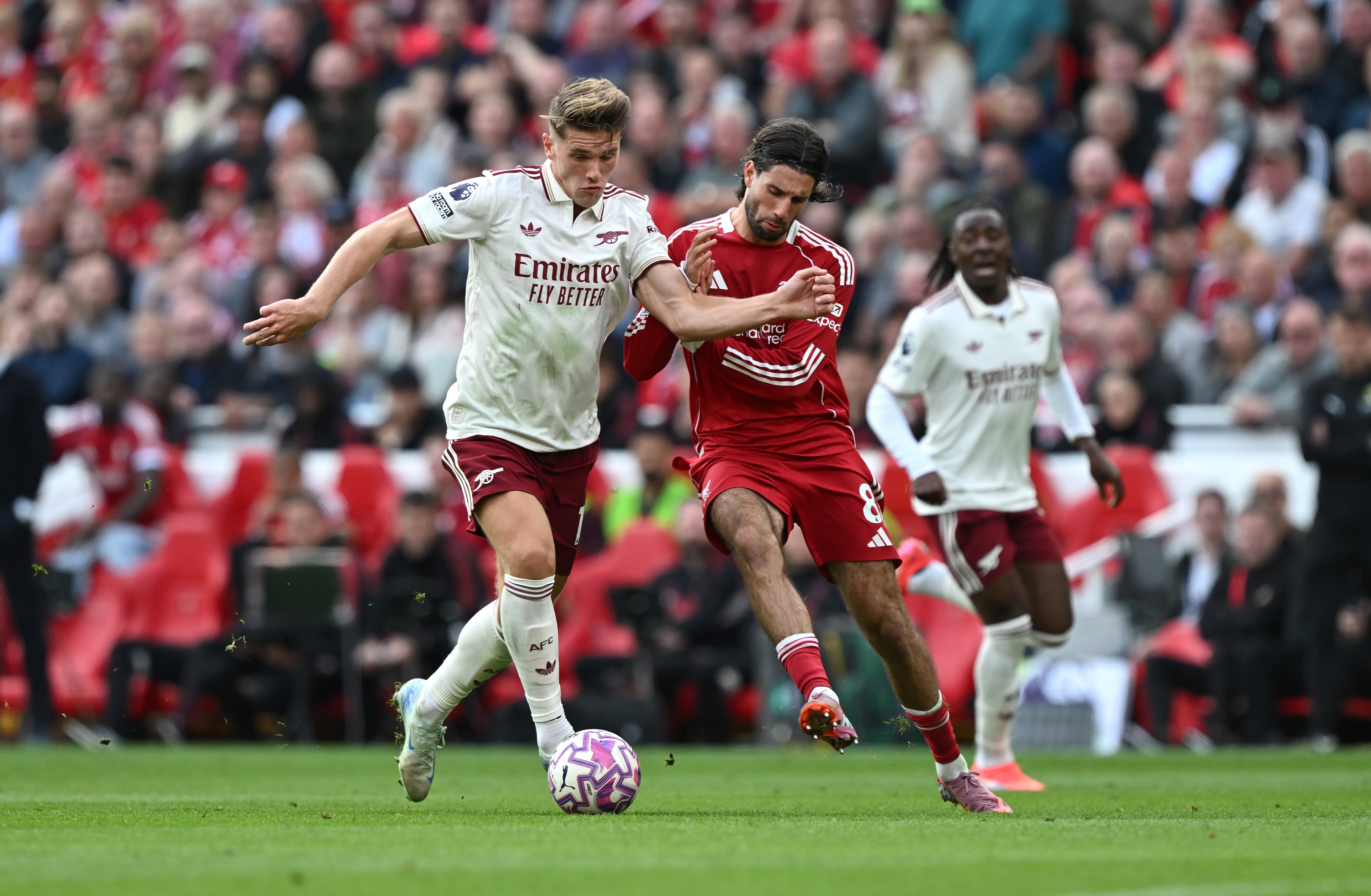 LIVERPOOL, ENGLAND - AUGUST 31: Viktor Gyoekeres of Arsenal is challenged by Dominik Szoboszlai of Liverpool during the Premier League match between Liverpool and Arsenal at Anfield on August 31, 2025 in Liverpool, England. (Photo by David Price/Arsenal FC via Getty Images)