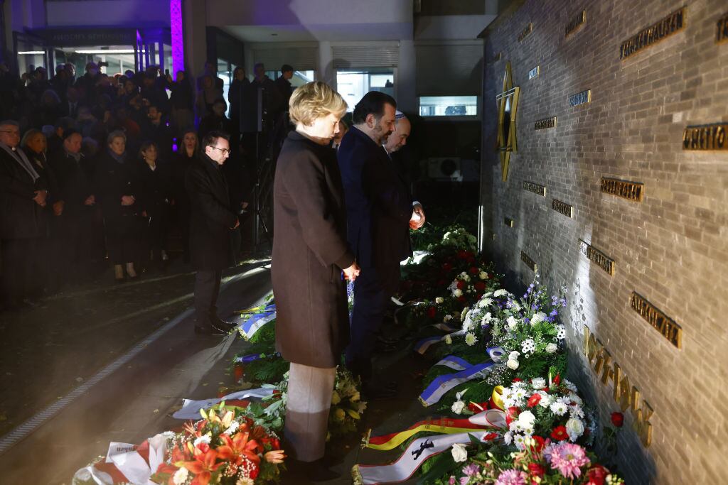 BERLIN, GERMANY - NOVEMBER 9: Cornelia Seibeld, President of the Abgeordnetenhaus of Berlin, Gideon Joffe President of the Jewish Community in Berlin Israel Ambassador in Germany Ron Prosor, lay a wreath at the memorial during a ceremony to commemorate the 65th anniversary of the Kristallnacht pogroms on November 9, 2023 in Berlin, Germany. On November 9-10, 1938, Nazi-led mobs ransacked synagogues and other Jewish establishments across Germany. This year's anniversary is being commemorated with the fresh and horrific memory of the October 7 incursions by Hamas militants into Israel, in which 1,400 people were killed in the worst one-day loss of Jewish life since the Holocaust. (Photo by Michele Tantussi/Getty Images)