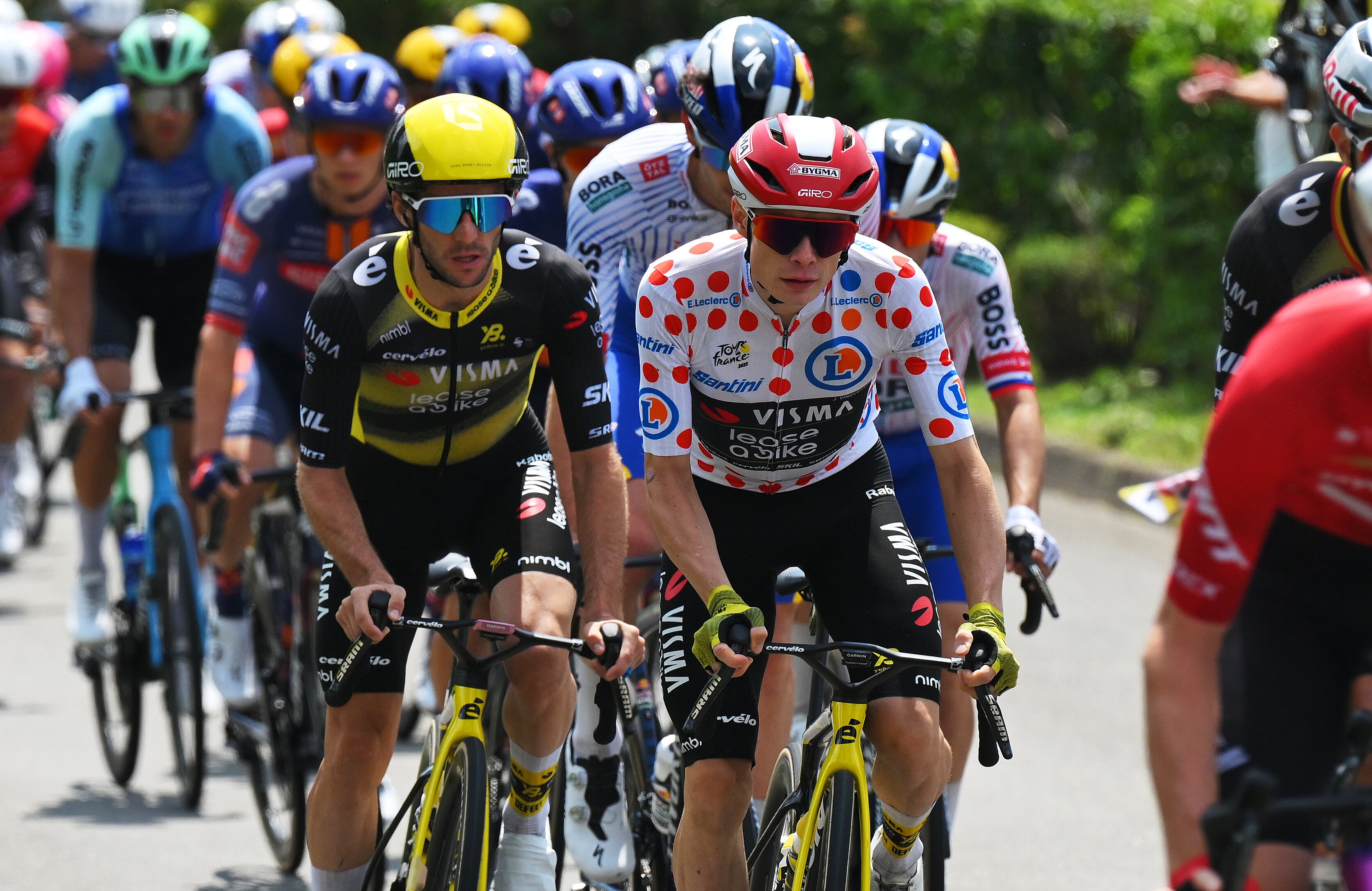 PONTARLIER, FRANCE - JULY 26: (L-R) Simon Yates of Great Britain and Jonas Vingegaard of Denmark and Team Visma | Lease a Bike  - Polka Dot Mountain Jersey compete during the 112th Tour de France 2025, Stage 20 a 184.2km stage from Nantua to Pontarlier / #UCIWT / on July 26, 2025 in Pontarlier, France. (Photo by Tim de Waele/Getty Images)