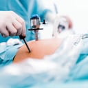 Surgeons performing laparoscopic surgery