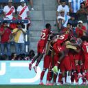 KANSAS CITY, KANSAS - JUNE 25: Jonathan David of Canada celebrates with teammates after scoring the team's first goal during the CONMEBOL Copa America 2024 between Peru and Canada at Children's Mercy Park on June 25, 2024 in Kansas City, Kansas. Jamie Squire/Getty Images/AFP (Photo by JAMIE SQUIRE / GETTY IMAGES NORTH AMERICA / Getty Images via AFP)