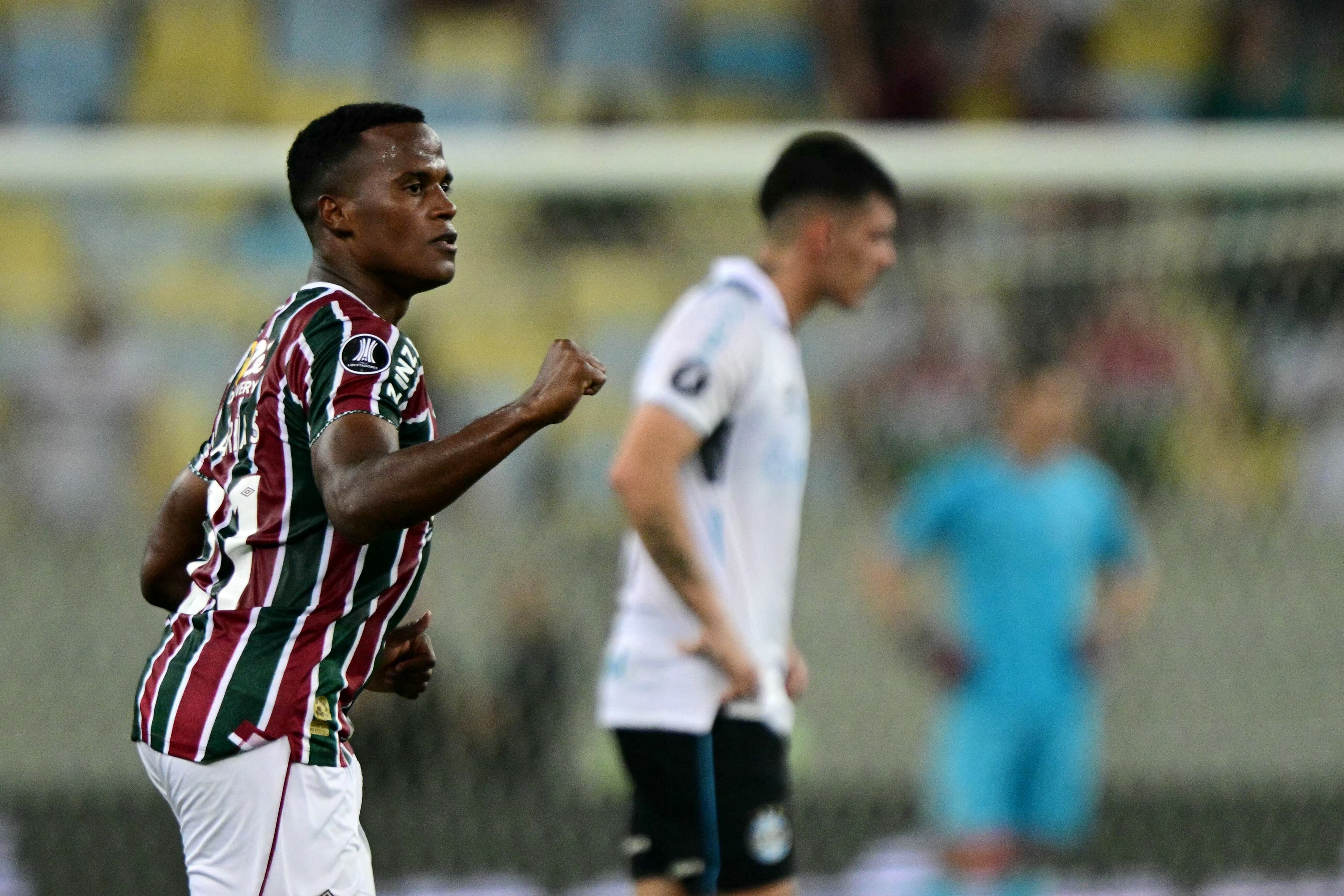 Fluminense's Colombian midfielder Jhon Arias celebrates scoring his team's second goal during the Copa Libertadores round of 16 second leg all-Brazilian football match between Fluminense and Gremio at the Maracana stadium in Rio de Janeiro, Brazil, on August 20, 2024. (Photo by Pablo PORCIUNCULA / AFP)