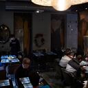MILAN, ITALY - JANUARY 15: People eat sitting inside an open restaurant during the "Io Apro" protest against the lockdown on January 15, 2021 in Milan, Italy. These days the Italian government is launching new restrictive rules for Covid-19, which continue to damage especially bars and restaurants. (Photo by Lorenzo Palizzolo/Getty Images)