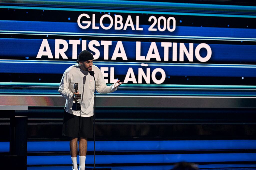CORAL GABLES, FLORIDA - OCTOBER 05: Bad Bunny accepts an award onstage during the 2023 Billboard Latin Music Awards at Watsco Center on October 05, 2023 in Coral Gables, Florida. (Photo by Jason Koerner/Getty Images)