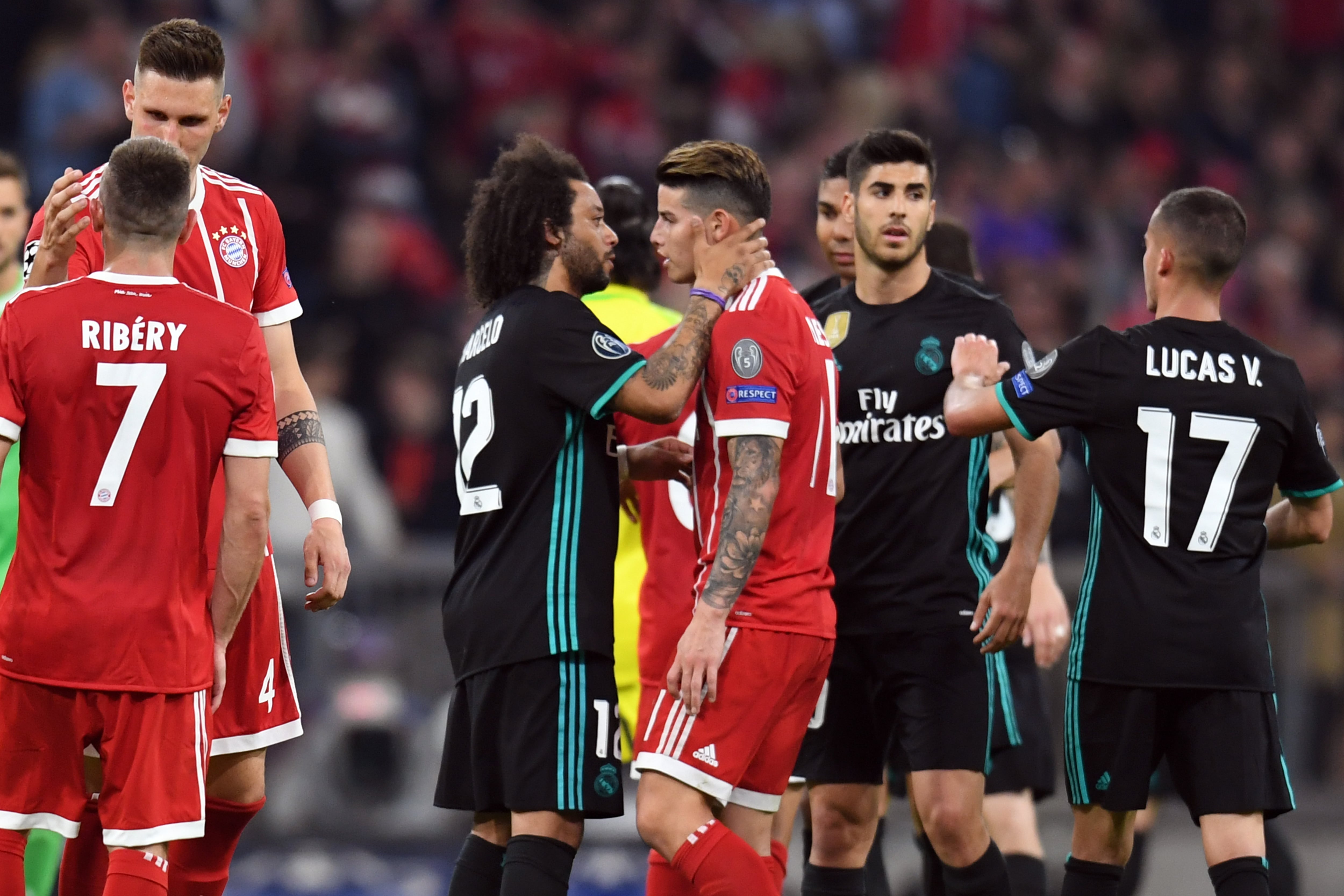 25 April 2018, Germany, Munich: Soccer, Champions League, knockout round, semi-final, first-leg, Bayern Munich vs. Real Madrid. Real Madrid Marcelo (M, l) with Munichs James Rodriguez (M, r) after the game. Photo: Sven Hoppe/dpa (Photo by Sven Hoppe/picture alliance via Getty Images)