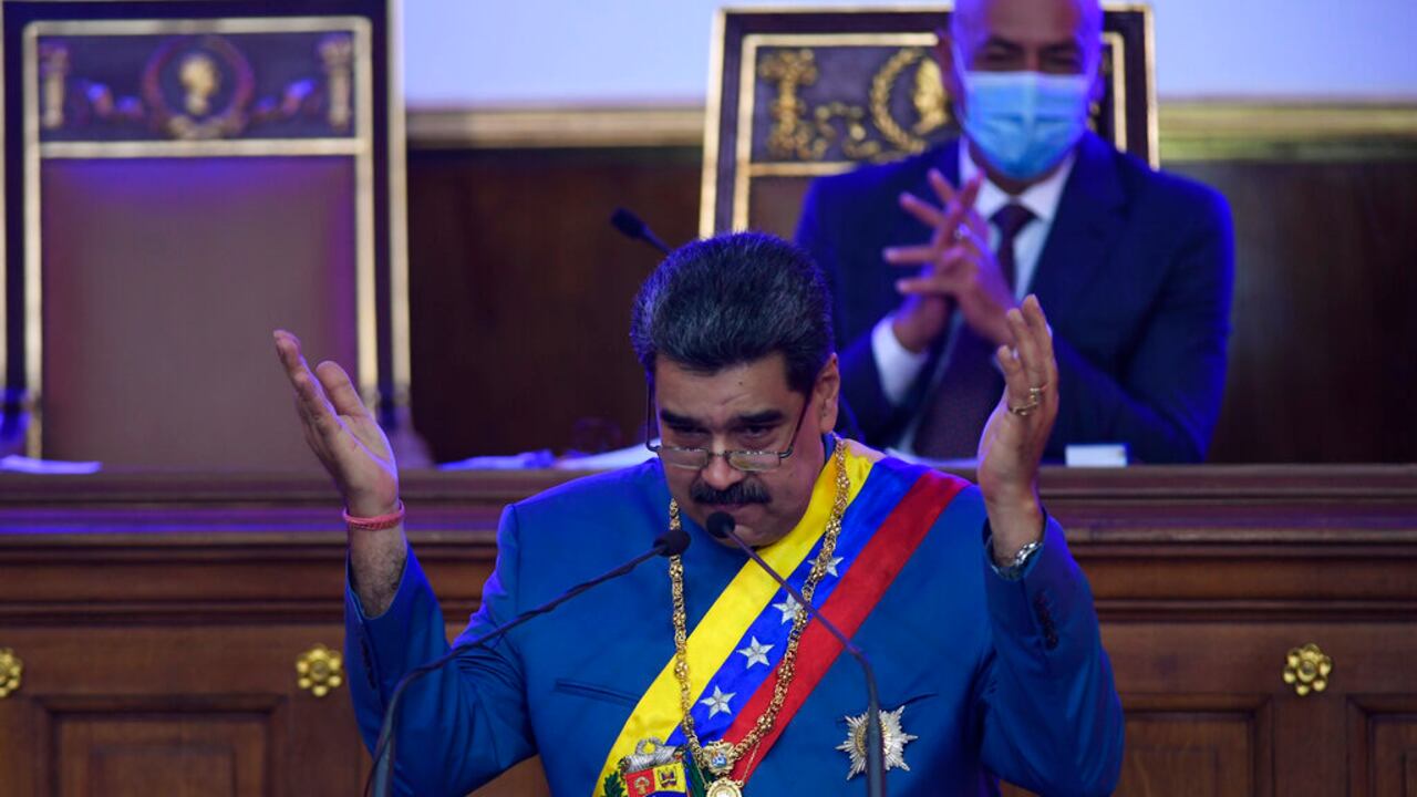 Venezuelan President Nicolas Maduro delivers his annual address to the nation before lawmakers at the National Assembly in Caracas, Venezuela, Tuesday, Jan. 12, 2021. (AP Photo/Matias Delacroix)