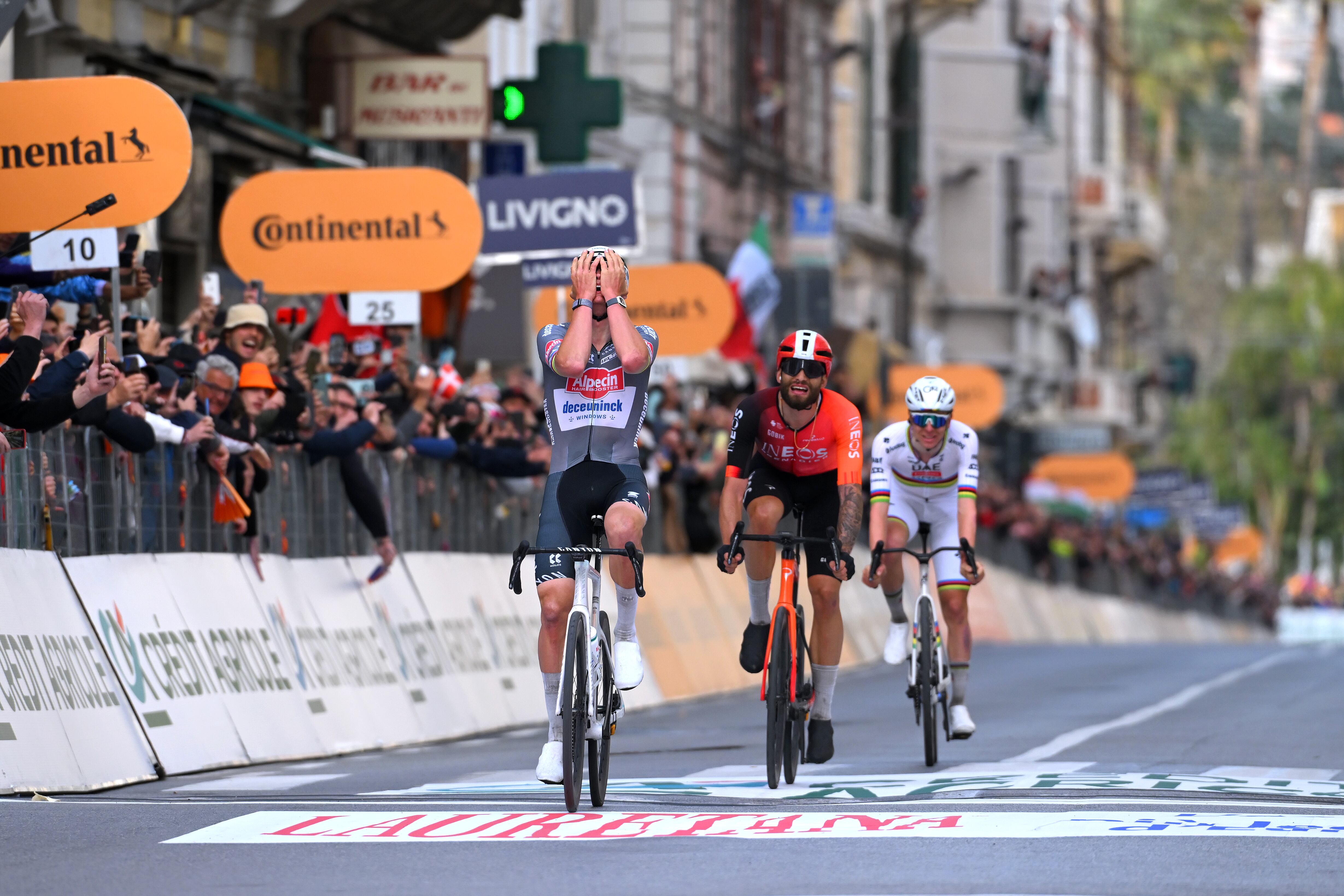 SANREMO, ITALY - MARCH 22: (L-R) Mathieu Van Der Poel of Netherlands and Team Alpecin – Deceuninck celebrates at finish line as race winner ahead of Filippo Ganna of Italy and Team INEOS Grenadiers and Tadej Pogacar of Slovenia and Team UAE Team Emirates during the 116th Milano-Sanremo 2025 a 289km one day race from Pavia to Sanremo / #UCIWT / on March 22, 2025 in Sanremo, Italy. (Photo by Tim de Waele/Getty Images)