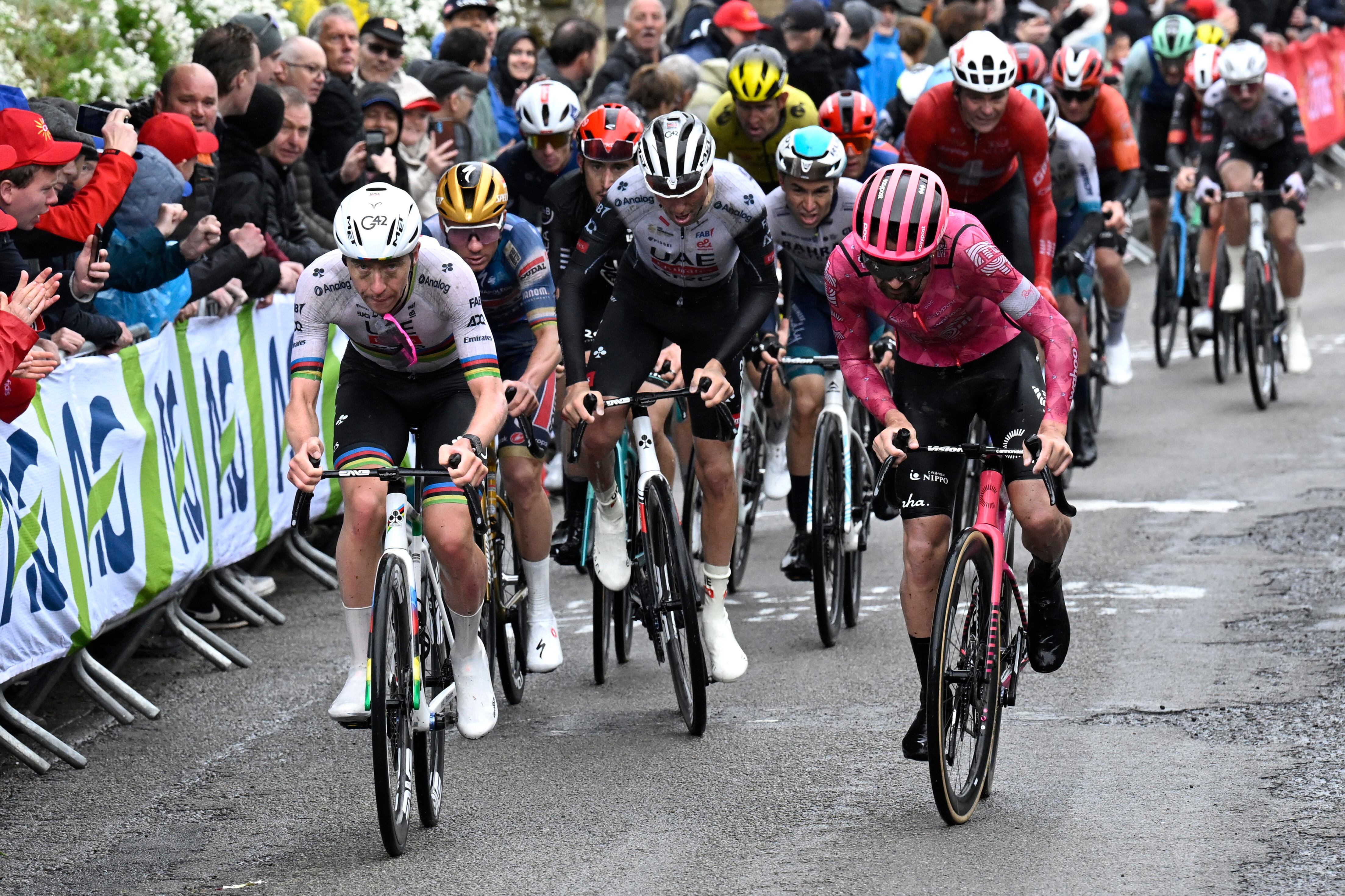 HUY, BELGIUM - APRIL 23: (L-R) Tadej Pogacar of Slovenia and UAE Team Emirates XRG, Remco Evenepoel of Belgium and Team Soudal Quick-Step and Ben Healy of Ireland and Team EF Education-Easypost compete during the 89th La Fleche Wallonne 2025 a 205.1km one day race from Ciney to Huy / #UCIWT / on April 23, 2025 in Huy, Belgium. (Photo by Dirk Waem - Pool/Getty Imag