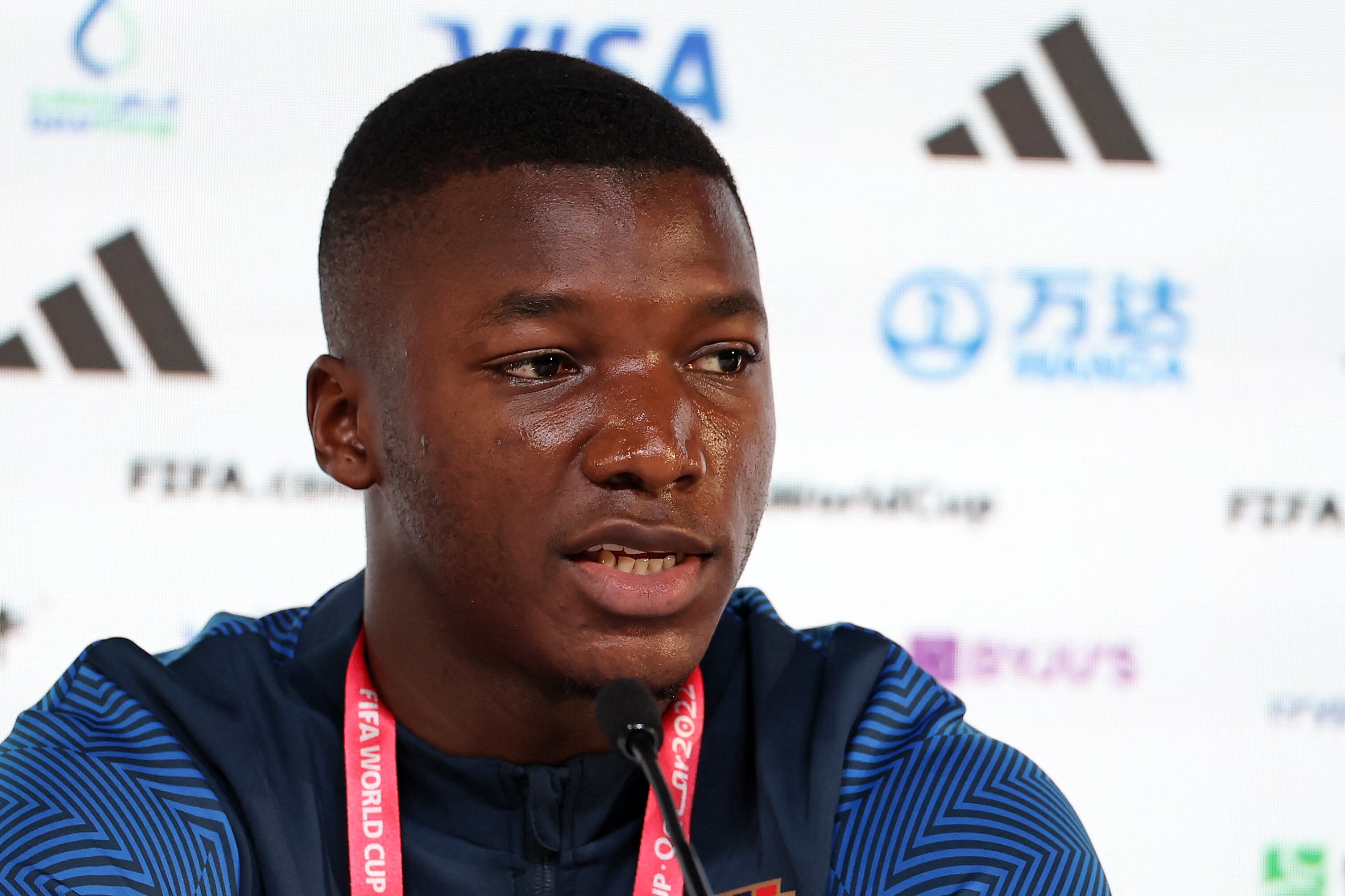 (FILES) Ecuador's midfielder Moises Caicedo attends a press conference at the Qatar National Convention Center (QNCC) in Doha on November 19, 2022 on the eve of the Qatar 2022 World Cup football match between Qatar and Ecuador. Liverpool have agreed a British record transfer fee of �110 million ($140 million, 127 million euros) for Brighton midfielder Moises Caicedo, according to media reports on Friday August 11. (Photo by KARIM JAAFAR / AFP)