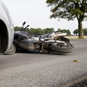 Motorbike Accident on the road with a car