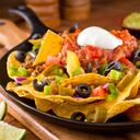 Si bien los nachos tienen sus raíces en México, la cocina tex-mex es la que se ha encargado de darle una popularidad universal.
