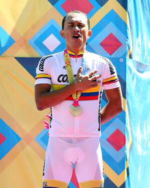 GUADALAJARA, MEXICO - OCTOBER 16: Marlon Alirio Perez of Colombia stands on the podium after winning gold in the Men's Individual Time Trial at the Time Trial Cycling Circuit during Day Two of the XVI Pan American Games on October 16, 2011 in Guadalajara, Mexico. (Photo by Scott Heavey/Getty Images)