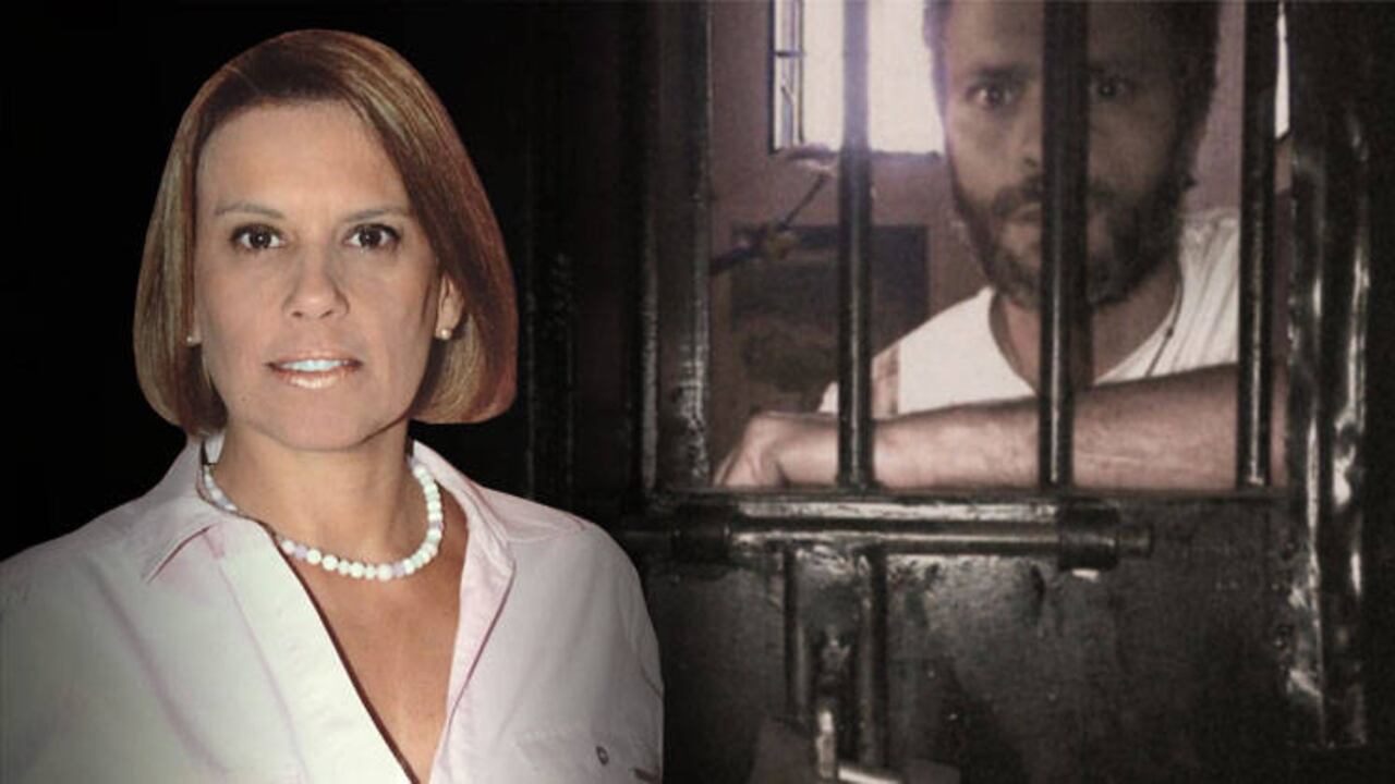 Abogada venezolana Lilia Camejo, directora ejecutiva de la ONG Justicia Venezolana (al frente) y Leopoldo López, el político privado de la libertad del partido Voluntad Popular (al fondo).