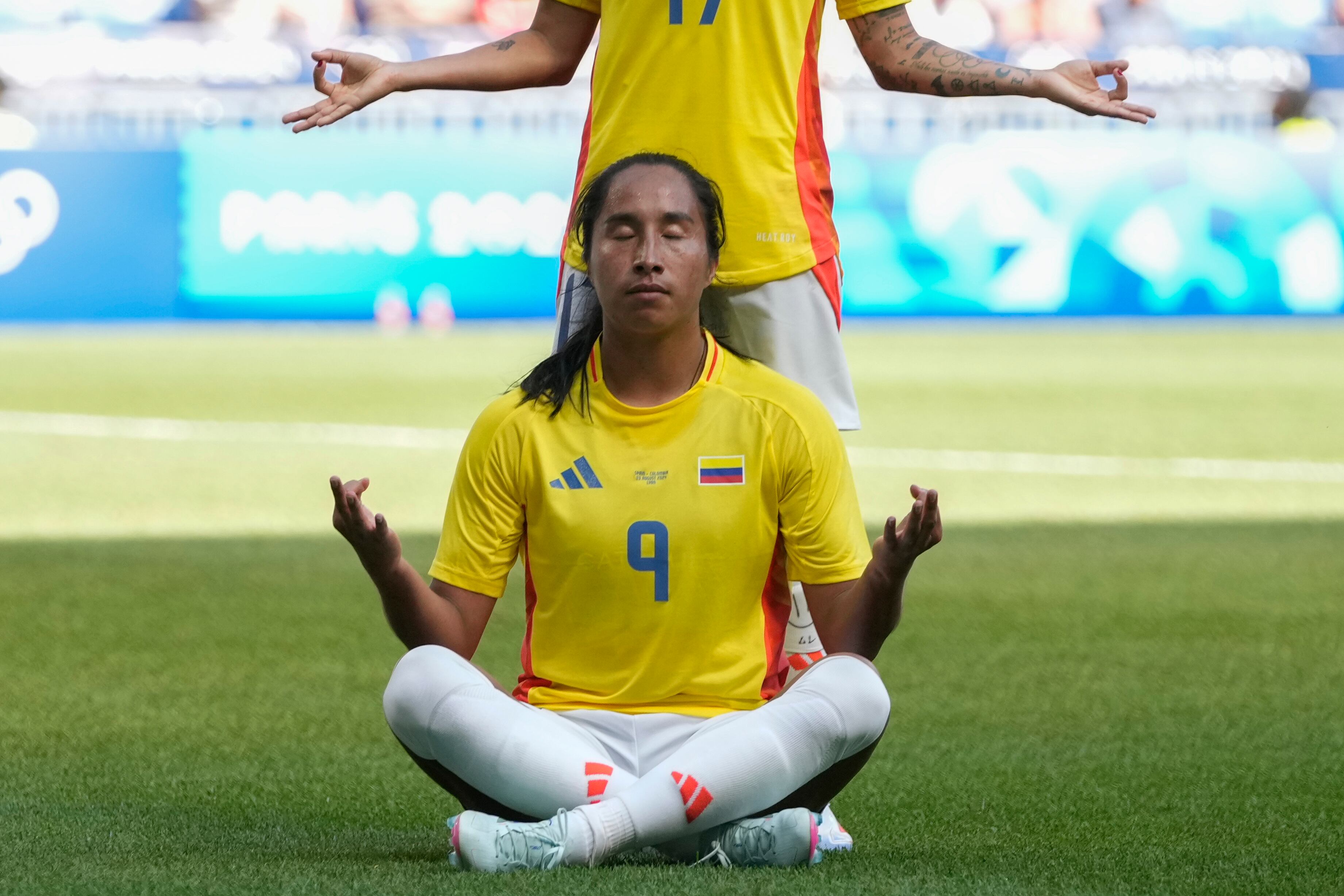 Colombia's Mayra Ramirez celebrates after scoring her side's opening goal during the women's quarter-final soccer match between Spain and Colombia, at Lyon Stadium, during the 2024 Summer Olympics, Saturday, Aug. 3, 2024, in Decines, France. (AP Photo/Silvia Izquierdo)