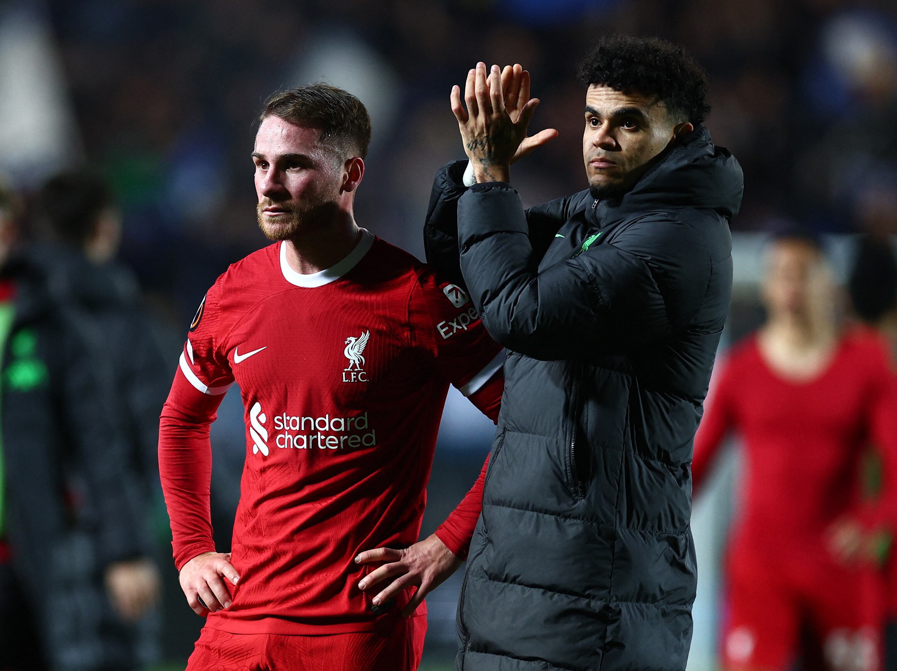Soccer Football - Europa League - Quarter Final - Second Leg - Atalanta v Liverpool - Stadio Atleti Azzurri, Bergamo, Italy, - April 18, 2024 Liverpool's Alexis Mac Allister and Luis Diaz look dejected after the match REUTERS/Guglielmo Mangiapane