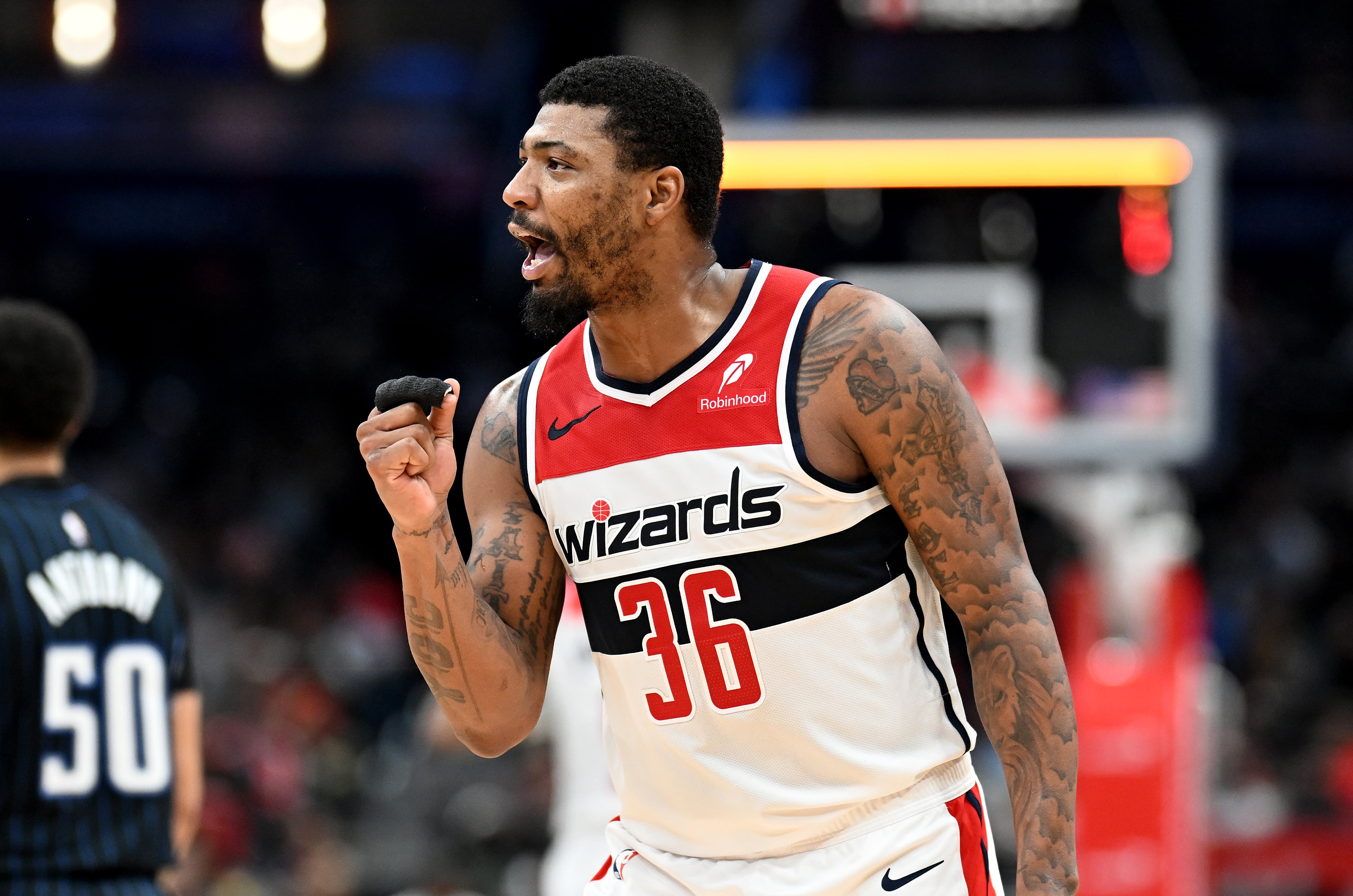 WASHINGTON, DC - APRIL 03: Marcus Smart #36 of the Washington Wizards celebrates during the game against the Orlando Magic at Capital One Arena on April 03, 2025 in Washington, DC. NOTE TO USER: User expressly acknowledges and agrees that, by downloading and or using this photograph, User is consenting to the terms and conditions of the Getty Images License Agreement. (Photo by G Fiume/Getty Images)