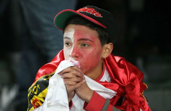 La cara de este hincha del Santa Fe lo dice todo. Foto: León Darío Peláez