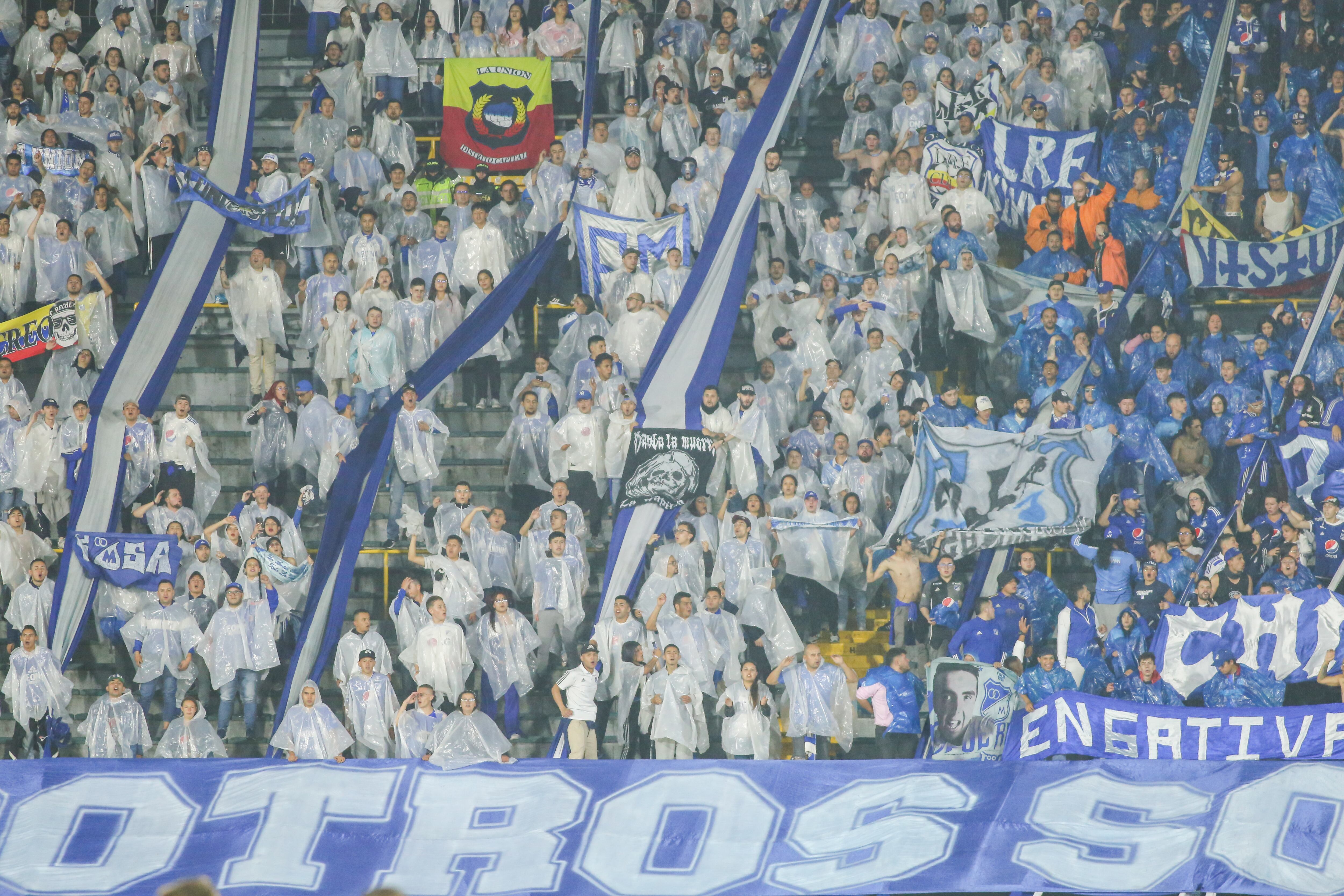 Millonarios FC fans support their team during the match between Millonarios FC vs CA Penarol of Uruguay for date 4 of CONMEBOL Sudamericana played at the Nemesio Camacho El Campin stadium in the city of Bogota, Colombia. (Photo by Daniel Garzon Herazo/NurPhoto via Getty Images)
