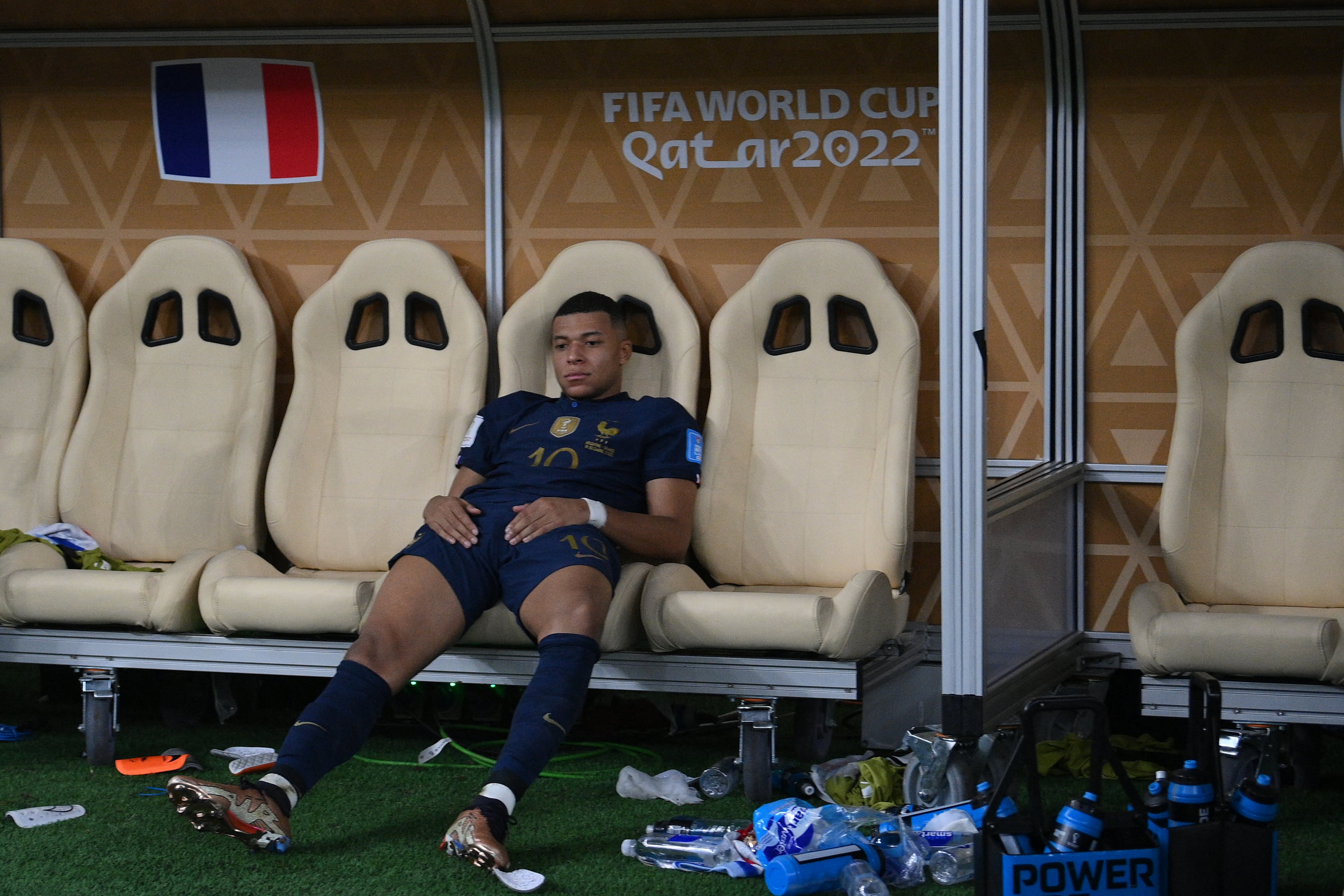 France's forward #10 Kylian Mbappe reacts after losing in the penalty shoot-out of the Qatar 2022 World Cup football final match between Argentina and France at Lusail Stadium in Lusail, north of Doha on December 18, 2022. (Photo by FRANCK FIFE / AFP)