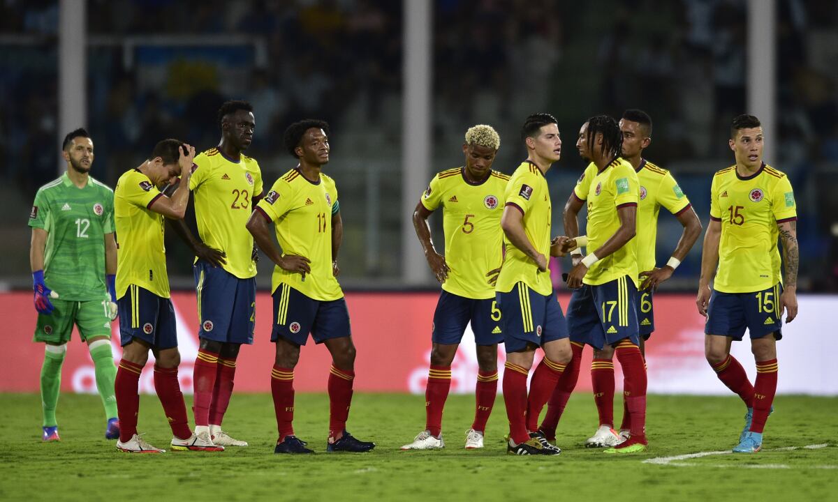 Colombia's soccer players react at the end first time of a qualifying soccer match for the FIFA World Cup Qatar 2022 against Argentina at Mario Alberto Kempes stadium in Cordoba, Argentina, Tuesday, Feb. 1, 2022. (AP/Gustavo Garello)