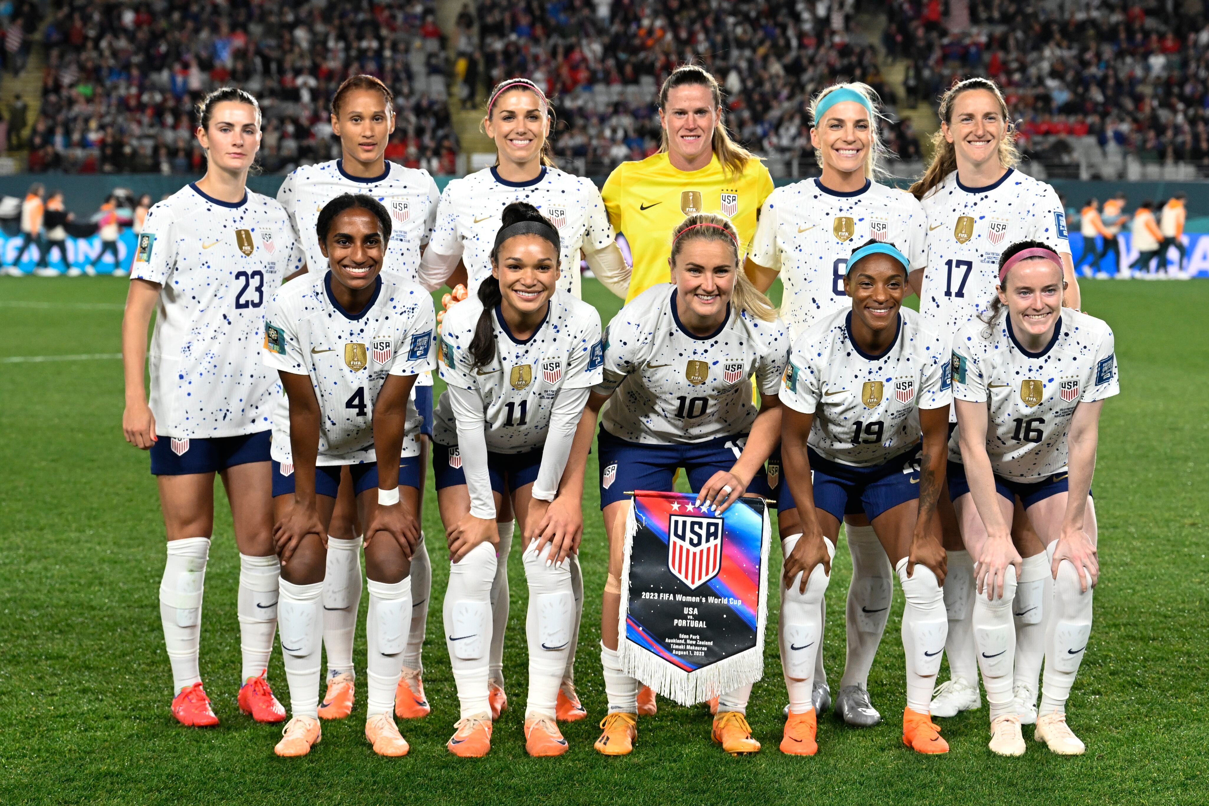 The US pose for a team photo ahead of the Women's World Cup Group E soccer match between Portugal and the United States at Eden Park in Auckland, New Zealand, Tuesday, Aug. 1, 2023. (AP Photo/Andrew Cornaga)