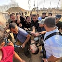 Palestinians break into the Israeli side of Israel-Gaza border fence after gunmen infiltrated areas of southern Israel, October 7, 2023. REUTERS/Mohammed Fayq Abu Mostafa NO RESALES. NO ARCHIVES. TPX IMAGES OF THE DAY