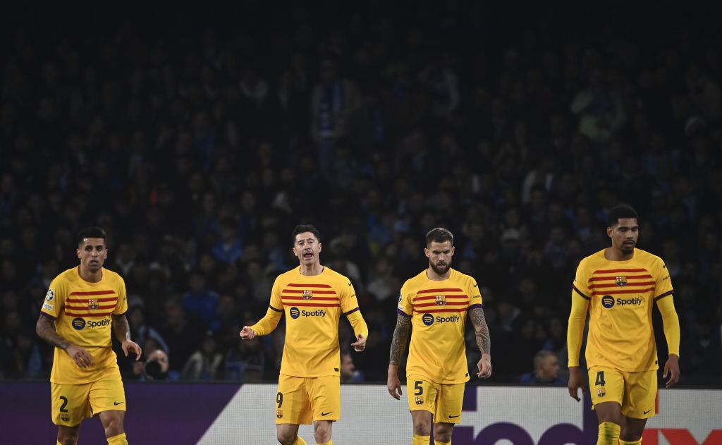 NAPLES, ITALY - FEBRUARY 21: Robert Lewandowski (2nd L) of FC Barcelona, celebrates with his teammates after scoring a goal during the UEFA Champions League round of 16 first leg football match between Napoli and FC Barcelona at the Diego Armando Maradona stadium in Naples, Italy, on February 21, 2024. (Photo by Isabella Bonotto/Anadolu via Getty Images)