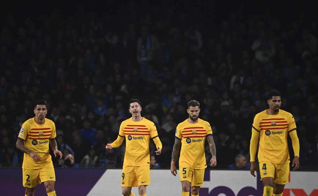 NAPLES, ITALY - FEBRUARY 21: Robert Lewandowski (2nd L) of FC Barcelona, celebrates with his teammates after scoring a goal during the UEFA Champions League round of 16 first leg football match between Napoli and FC Barcelona at the Diego Armando Maradona stadium in Naples, Italy, on February 21, 2024. (Photo by Isabella Bonotto/Anadolu via Getty Images)