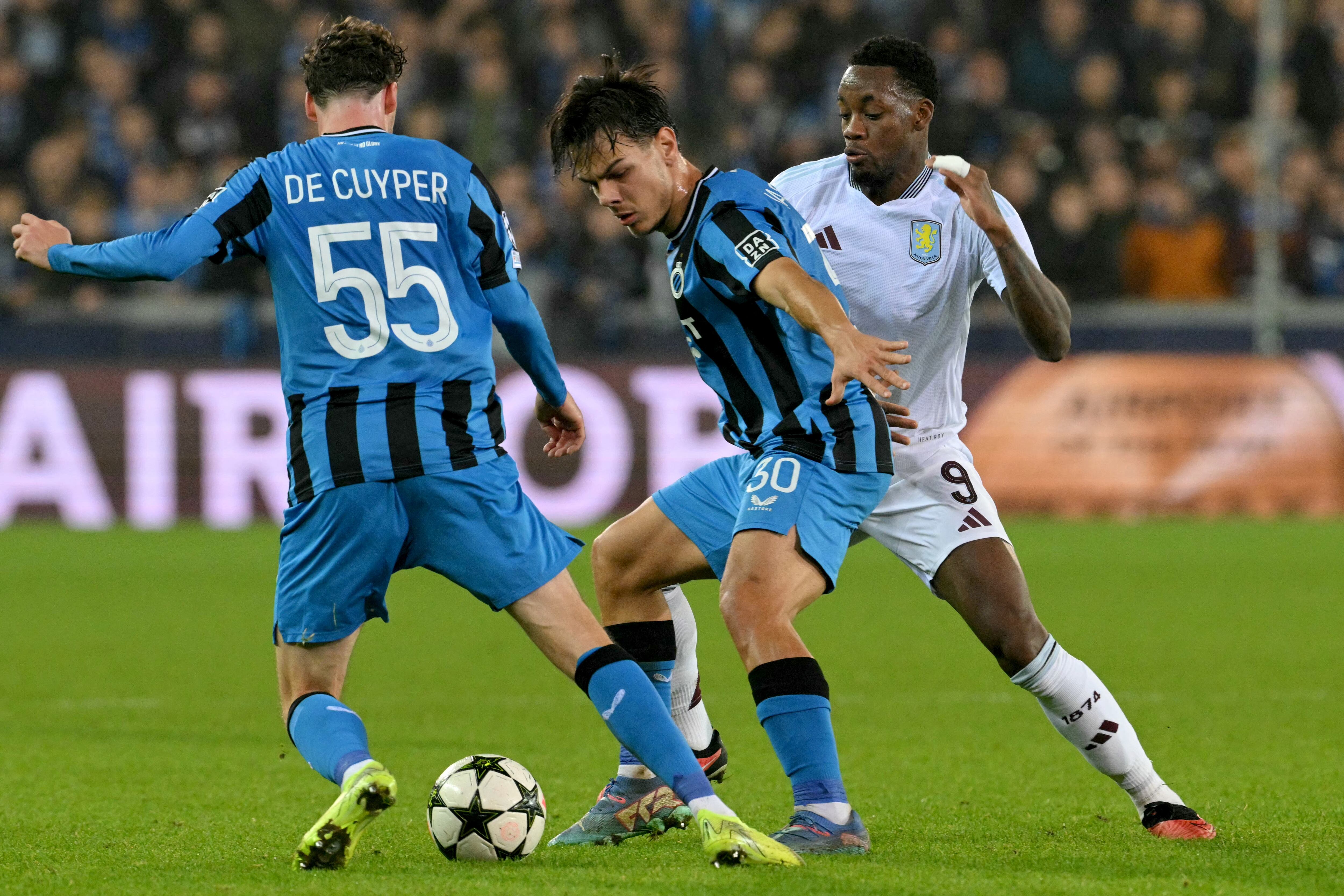 Aston Villa's Colombian forward #09 Jhon Duran (R) vies Club Brugge's Belgian defender #55 Maxim De Cuyper (L) and Club Brugge's Swiss midfielder #30 Ardon Jashari (C) during the UEFA Champions League, league phase day 4, football match between Club Brugge and Aston Villa at the Jan Breydelstadion in Bruges on November 6, 2024. (Photo by NICOLAS TUCAT / AFP)