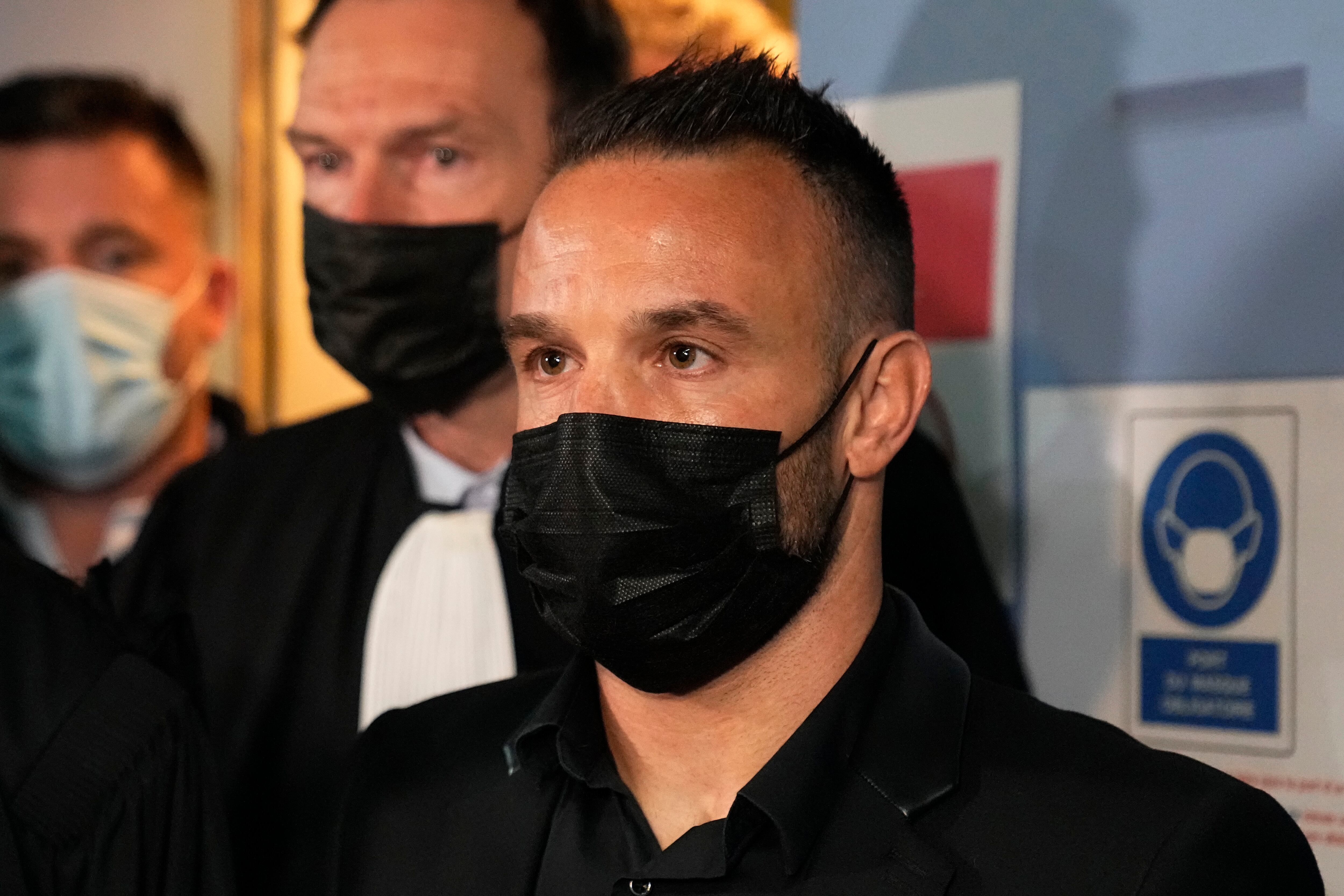 ormer France's soccer player Mathieu Valbuena leaves the courtroom Wednesday, Oct. 20, 2021 in Versailles, west of Paris. Real Madrid forward Karim Benzema wasn't present for the opening Wednesday of his three-day trial on France for involvement in an alleged attempt to blackmail his former France teammate Mathieu Valbuena over a sex tape. (AP Photo/Michel Euler)
