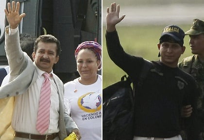 El exconcejal de Garzón (Huila) Armando Acuña y el infante de Marina Henry López a su llegada al aeropuerto de Florencia.