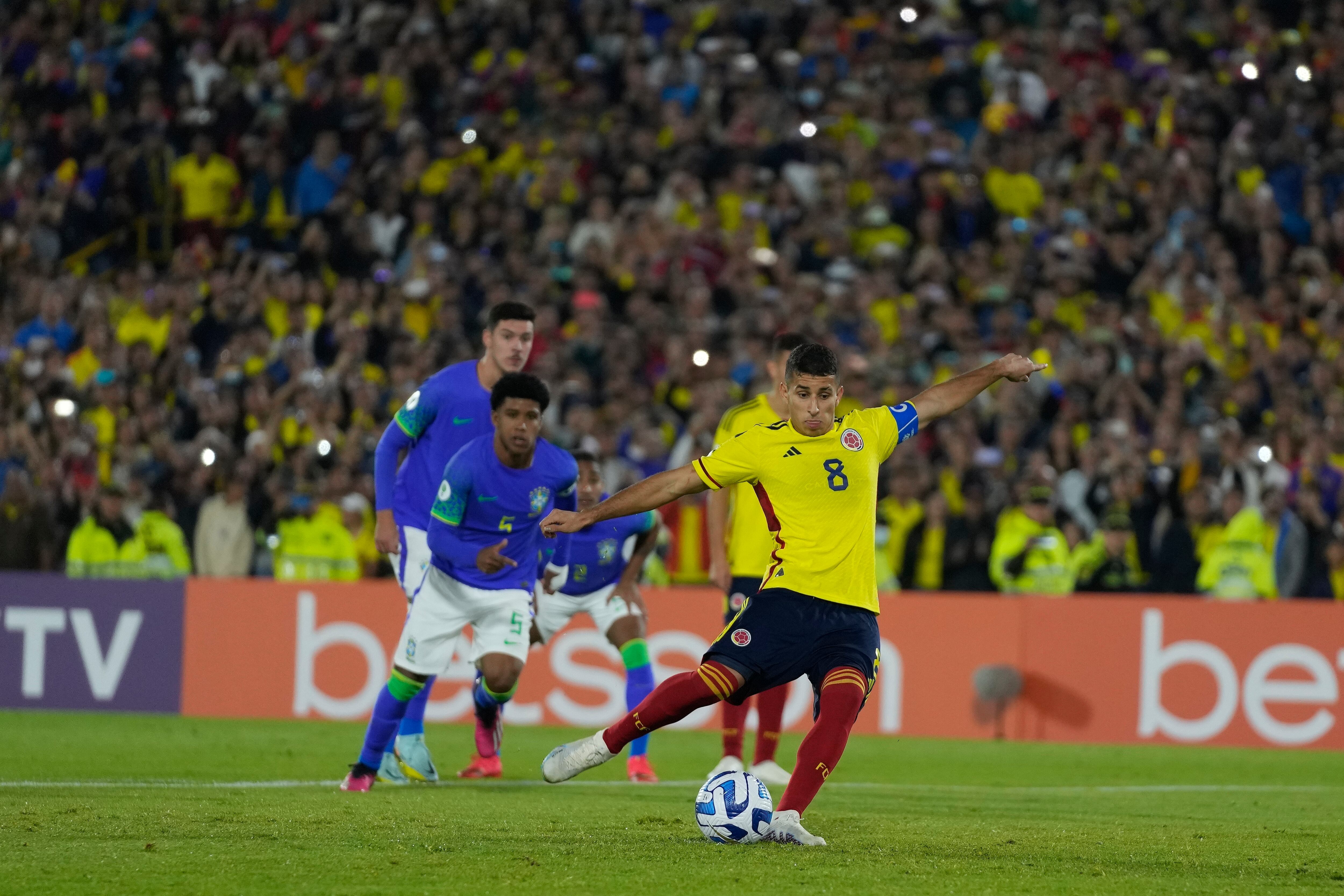 Colombia's Gustavo Puerta, right, fails to score on a penalty kick during a South America U-20 Championship soccer match against Brazil, in Bogota, Colombia, Thursday, Feb. 9, 2023. (AP Photo/Fernando Vergara)