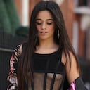 LONDON, ENGLAND - MARCH 24: Camila Cabello is seen wearing Dries van Noten suit with floral print & flared pants in black, Dion Lee black sheer top, black heeled shoes on March 24, 2022 in London, England. (Photo by Christian Vierig/GC Images)