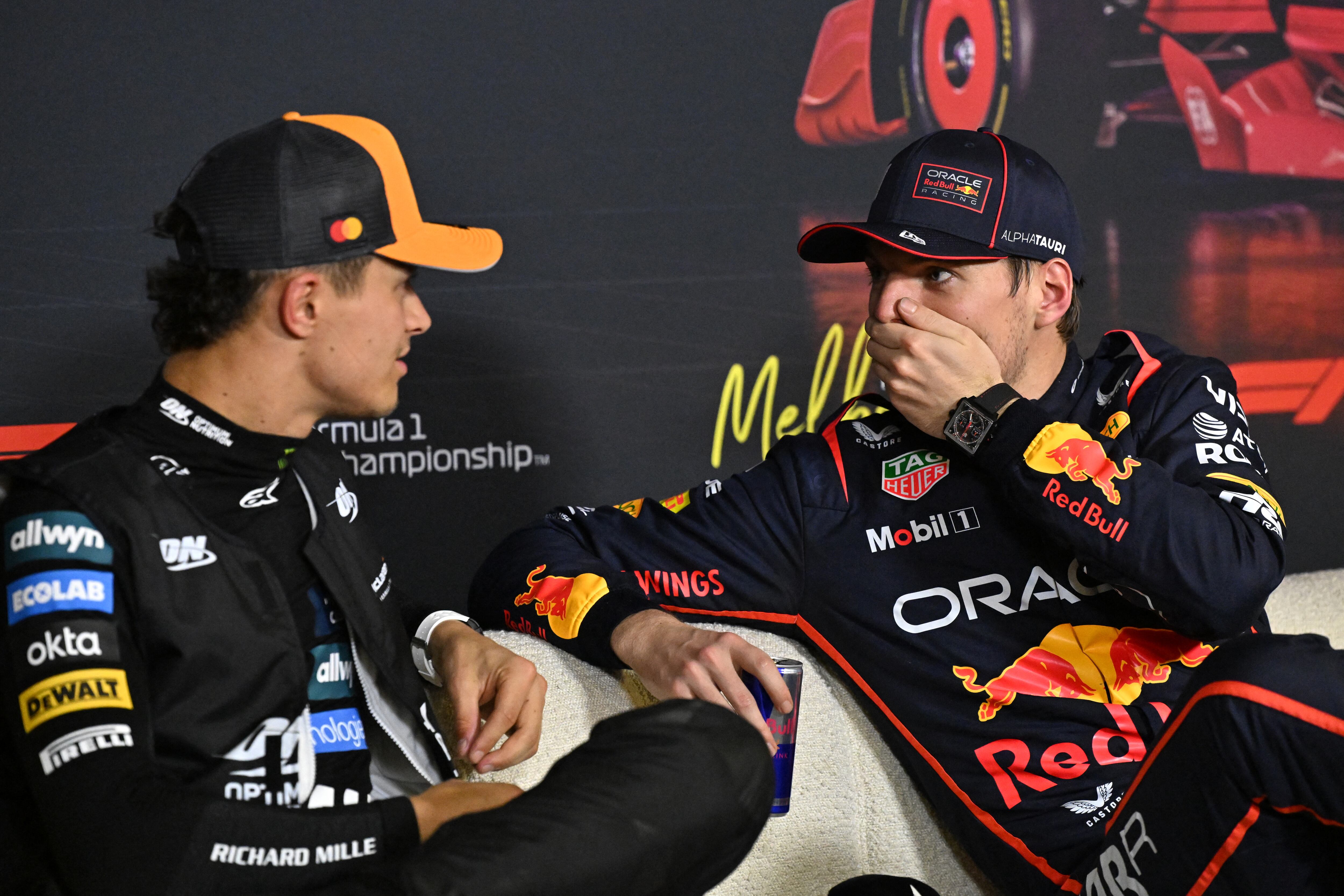 McLaren's British driver Lando Norris (L), who took pole position in the qualifying session, speaks with Red Bull Racing's Dutch driver Max Verstappen (R) who finished third during a press conference at the Formula One Australian Grand Prix at the Albert Park Circuit in Melbourne on March 15, 2025. (Photo by WILLIAM WEST / AFP) / -- IMAGE RESTRICTED TO EDITORIAL USE - STRICTLY NO COMMERCIAL USE --