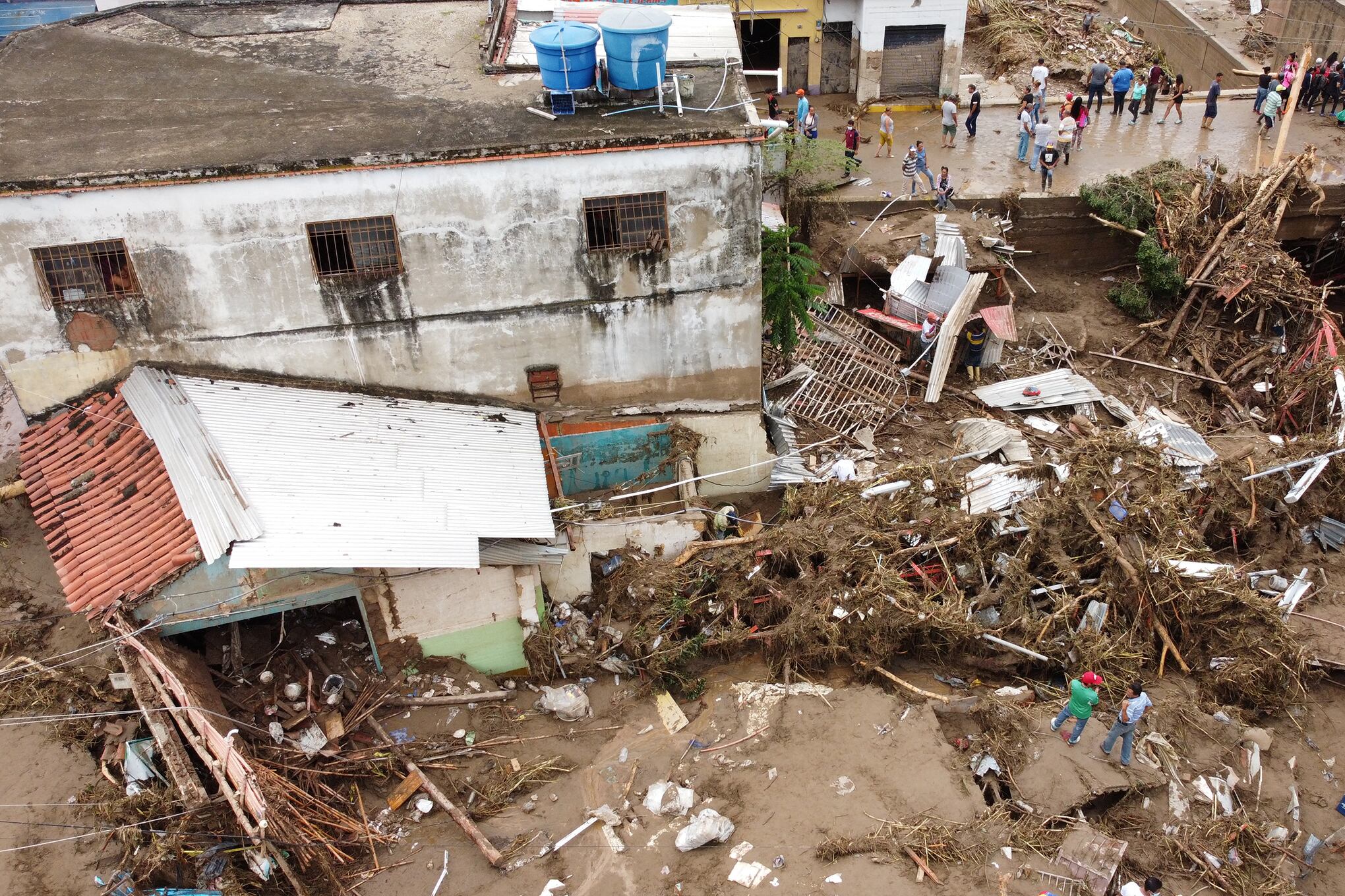 En imágenes : Rescatistas venezolanos buscan desaparecidos tras inundaciones mortales