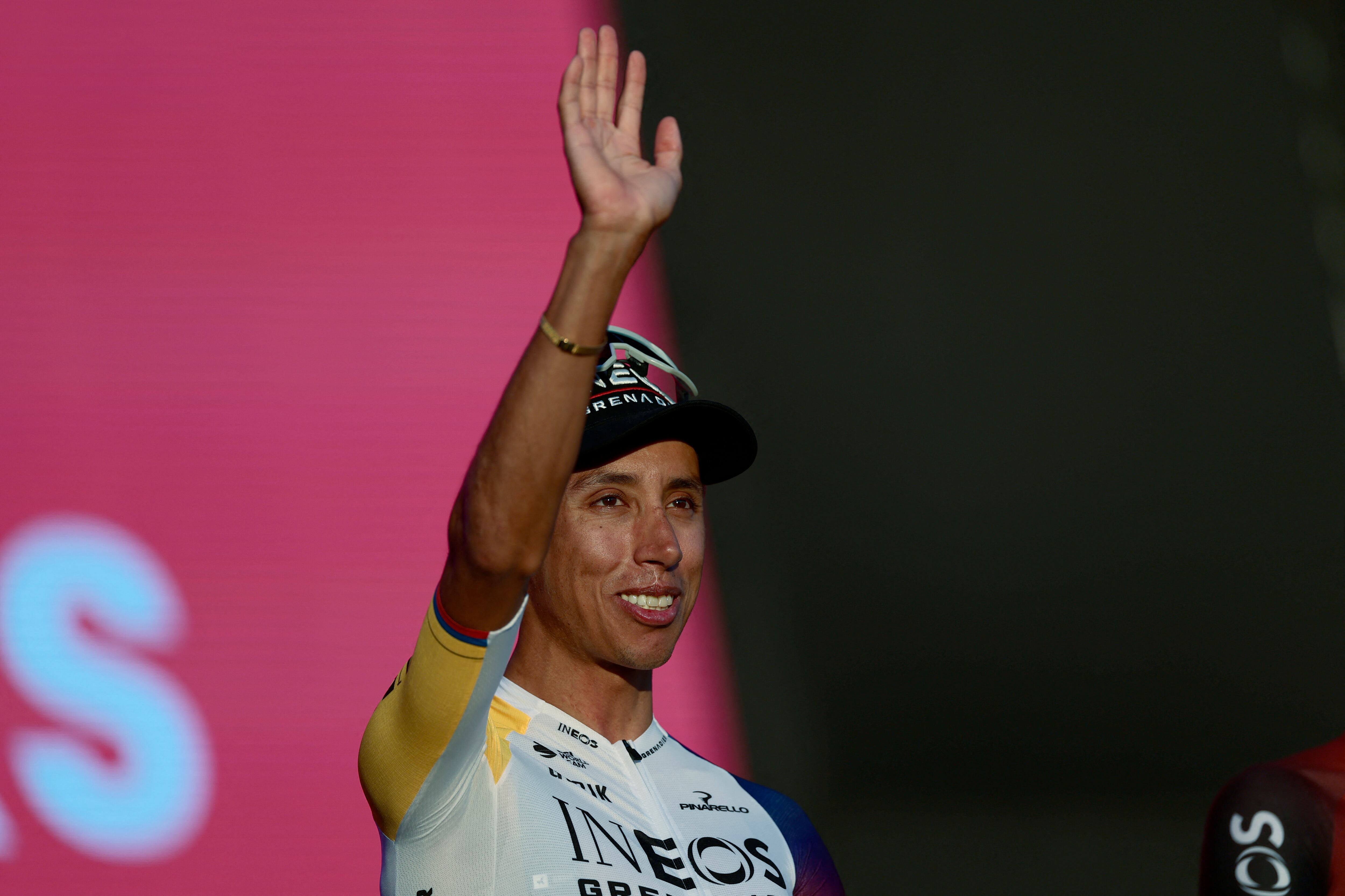 Ineos Grenadiers' Colombian rider Egan Bernal waves on stage during the opening ceremony and team presentation in Tirana, on May 7, 2025, two days before the departure of the Giro d'Italia 2025 cycling race. The Giro d'Italia 2025 cycling race will depart from Durres, Albania on May 9, and finish in Rome on June 1. (Photo by Luca Bettini / AFP)